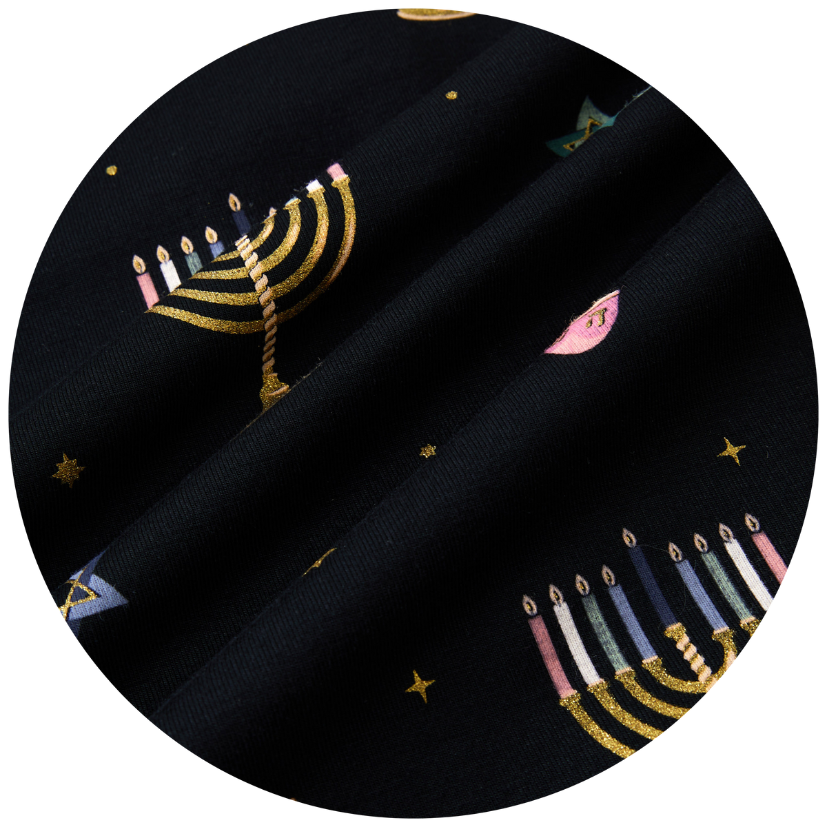 swatch of black fabric with Hanukkah elements 