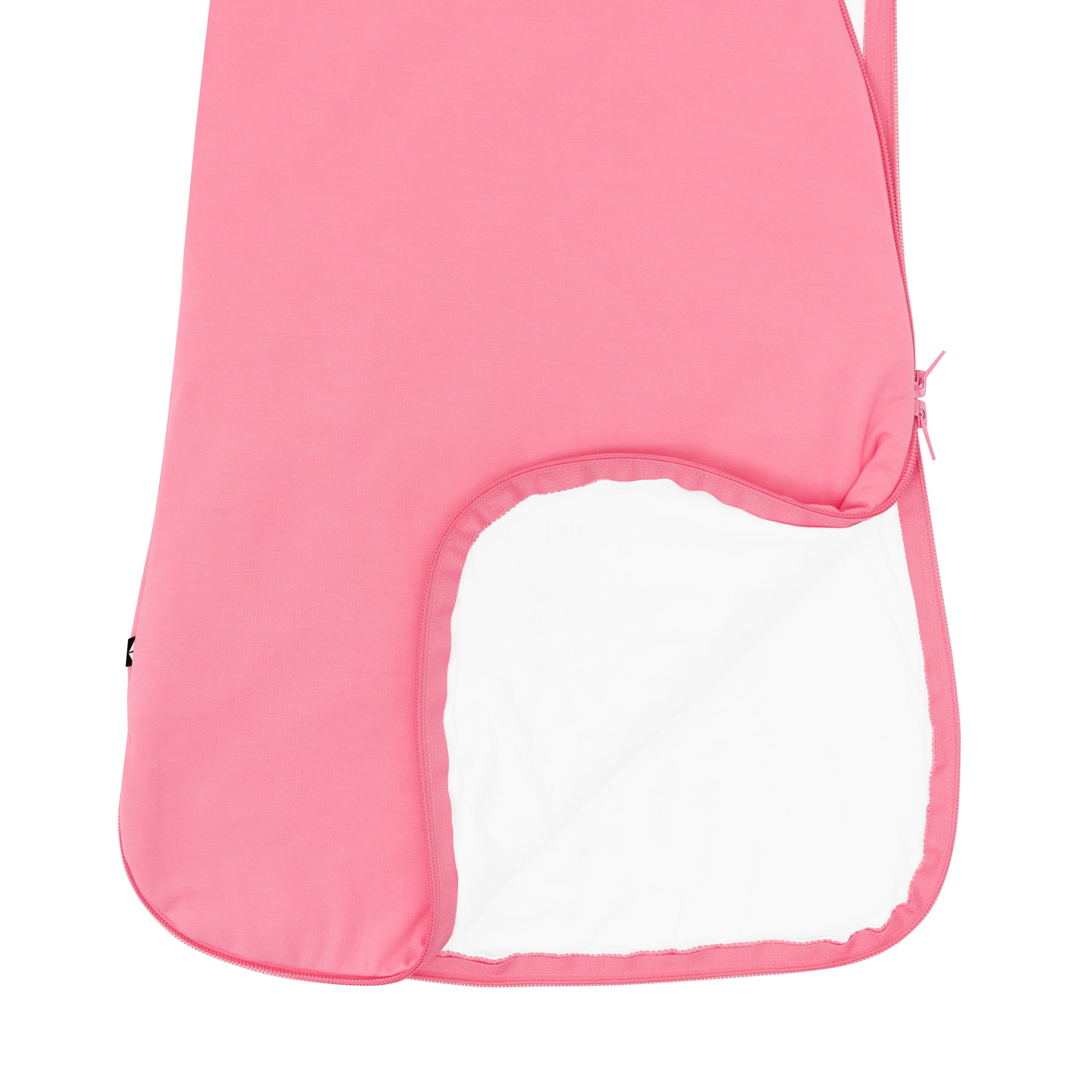 Kyte Baby Sleep Bag in Guava 1.0 showing dual zipper