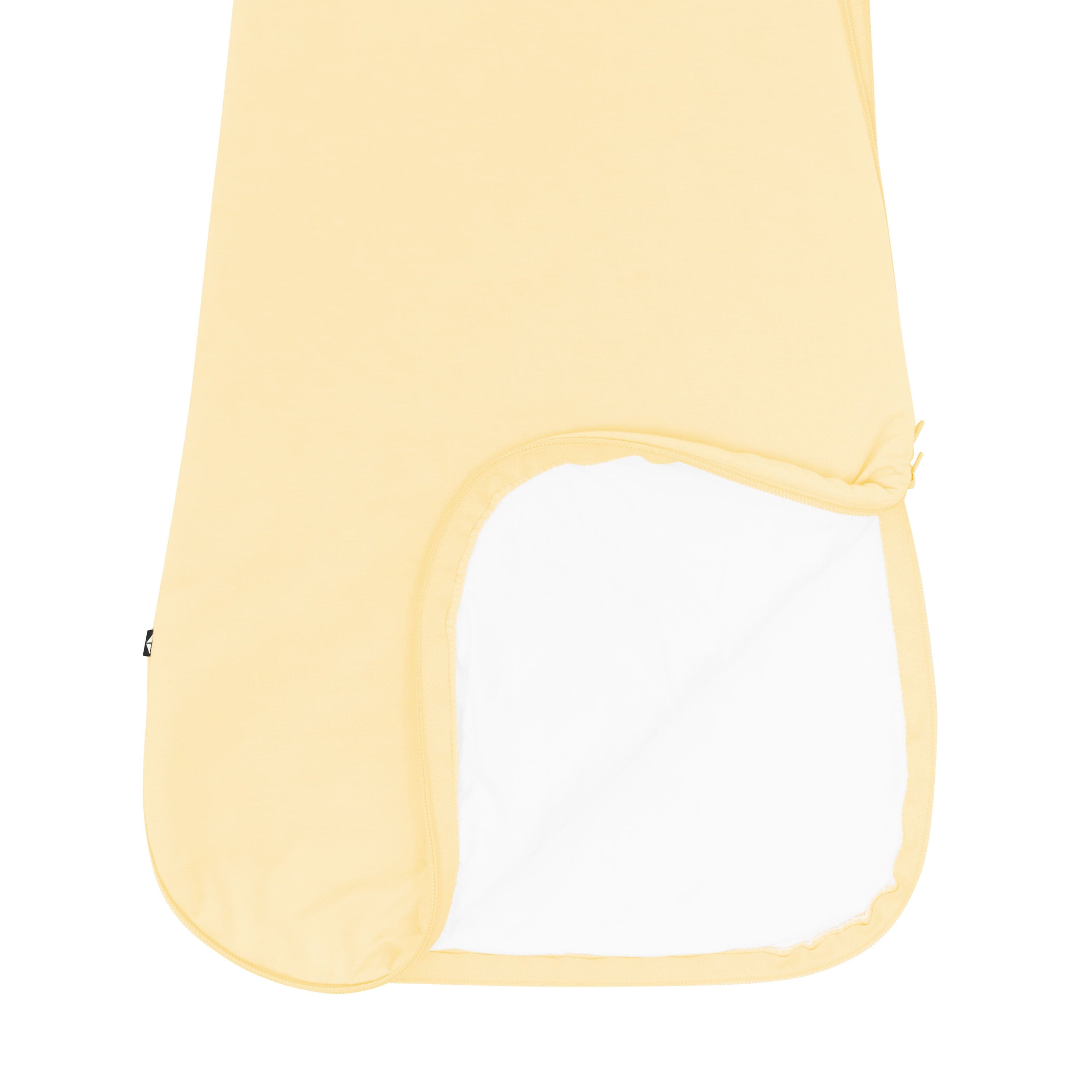 Kyte Baby Sleep Bag in Lilikoi 1.0 showing dual zipper