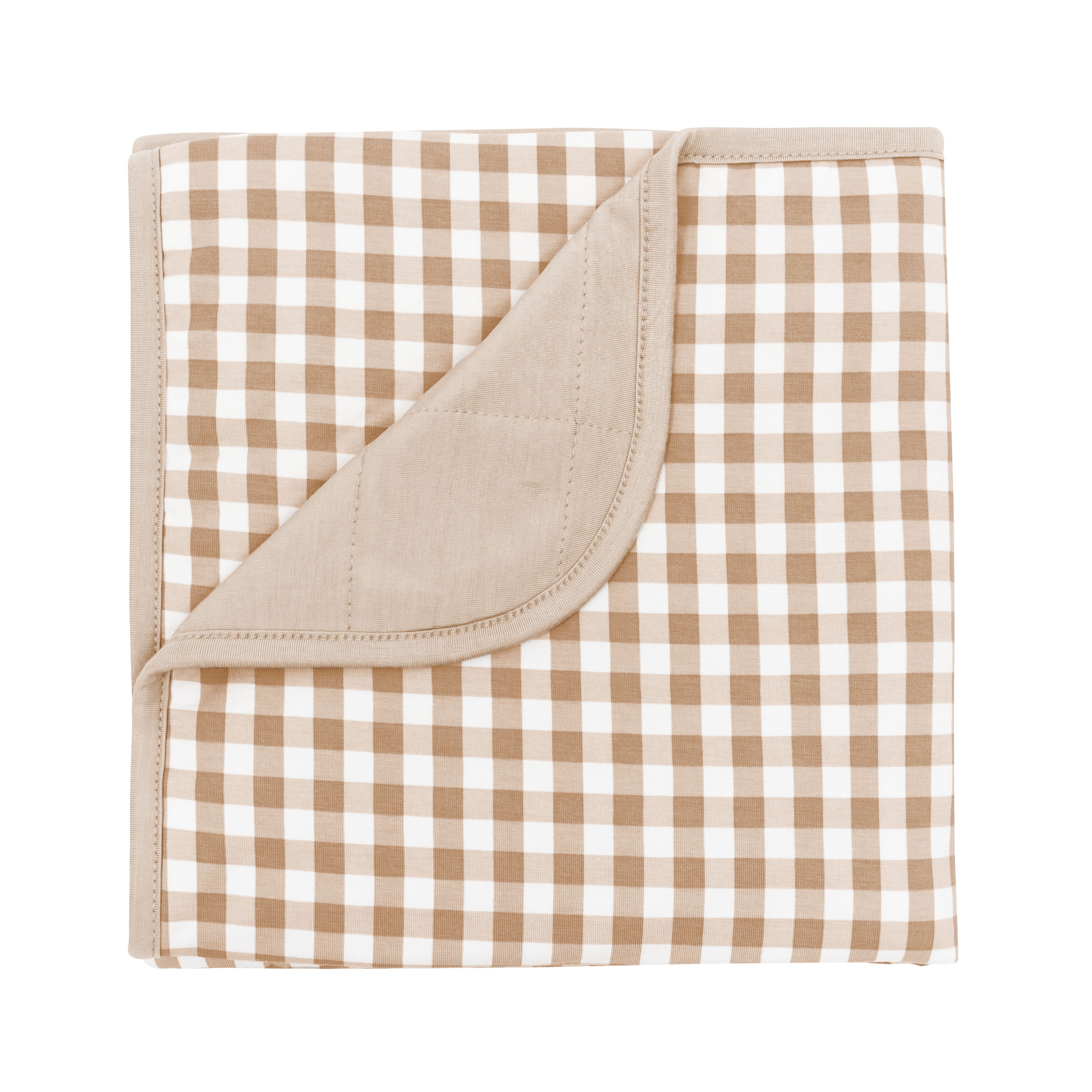 Baby Blanket in Gingham Bisque with the corner flipped down showing the Bisque colored backing