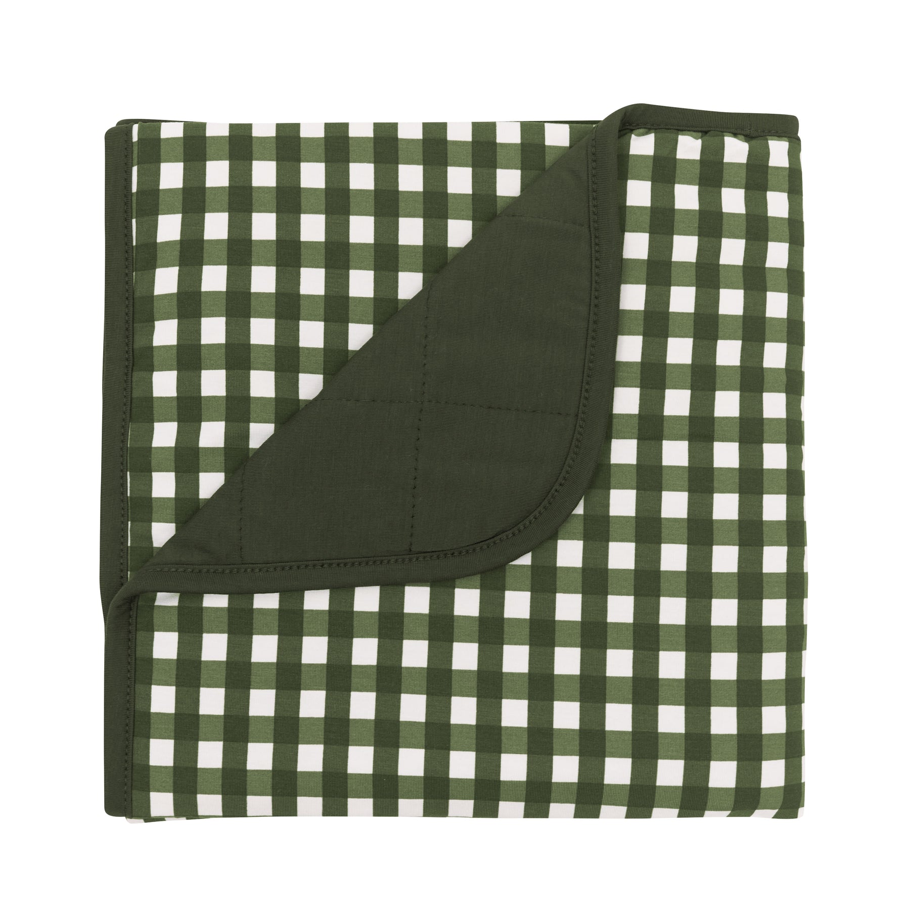 Baby Blanket in Gingham Fir with the corner folded down showing the Fir colored backing