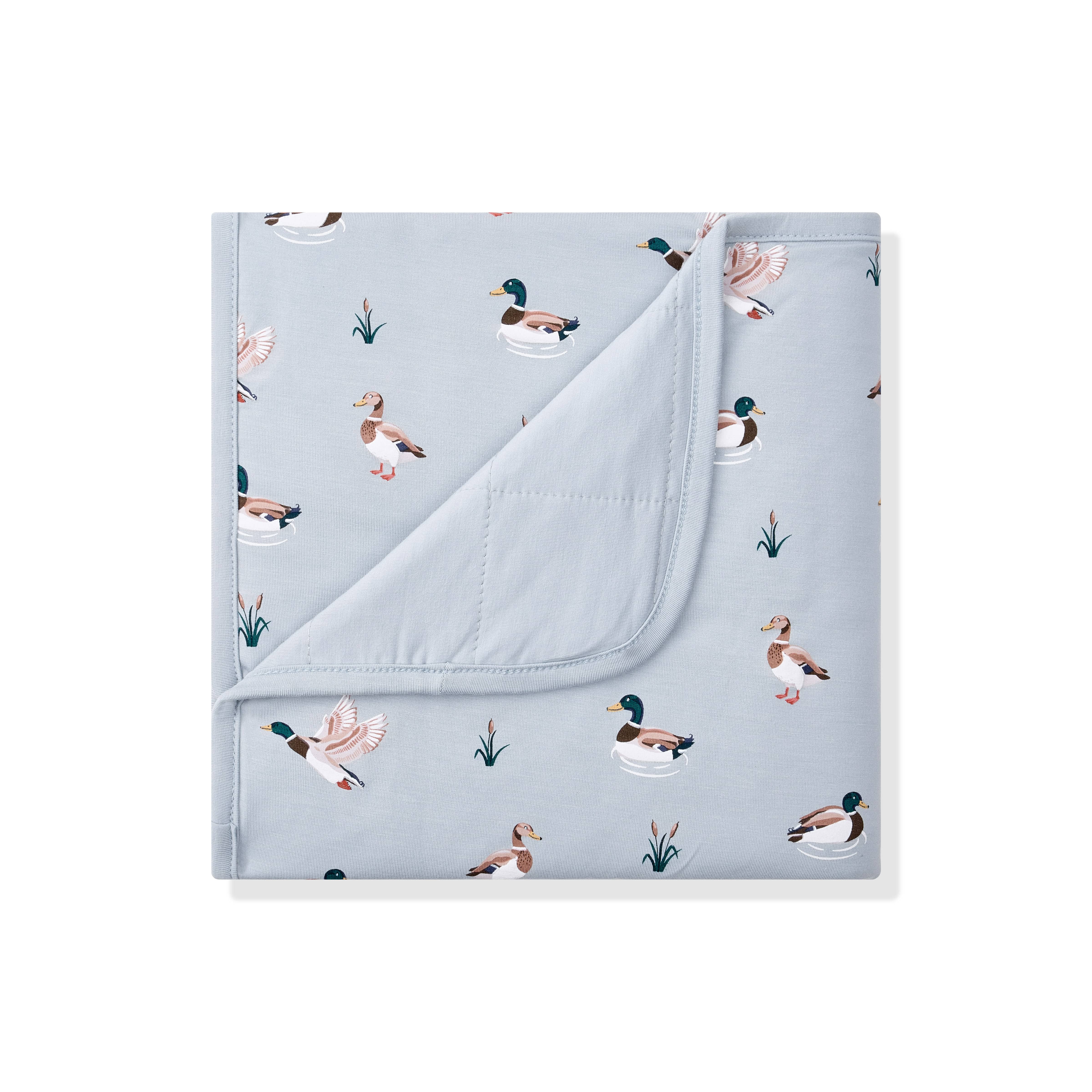 Baby Blanket in Mallard Duck with the corner folded down showing the light blue backing