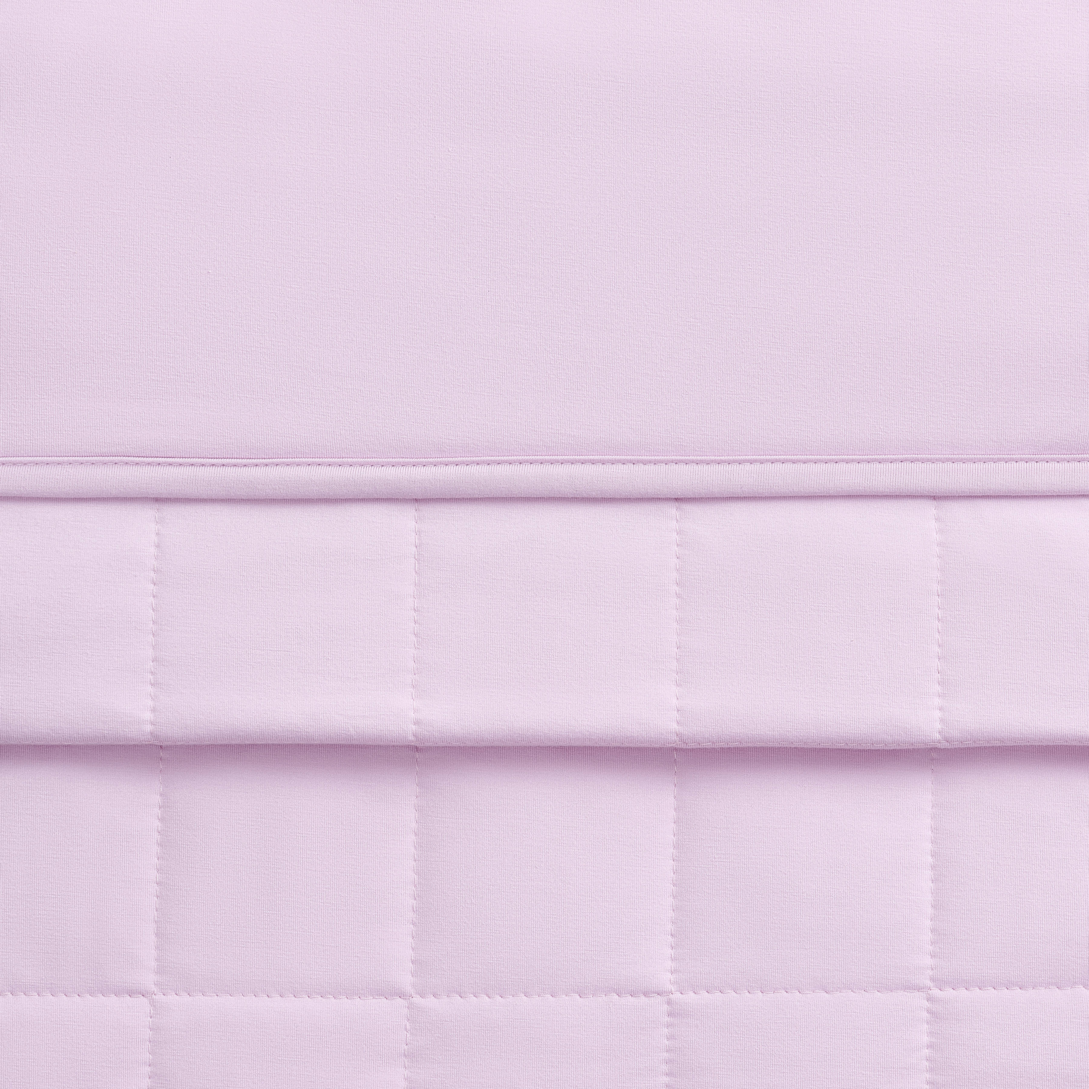 Close-up of a quilted purple blanket