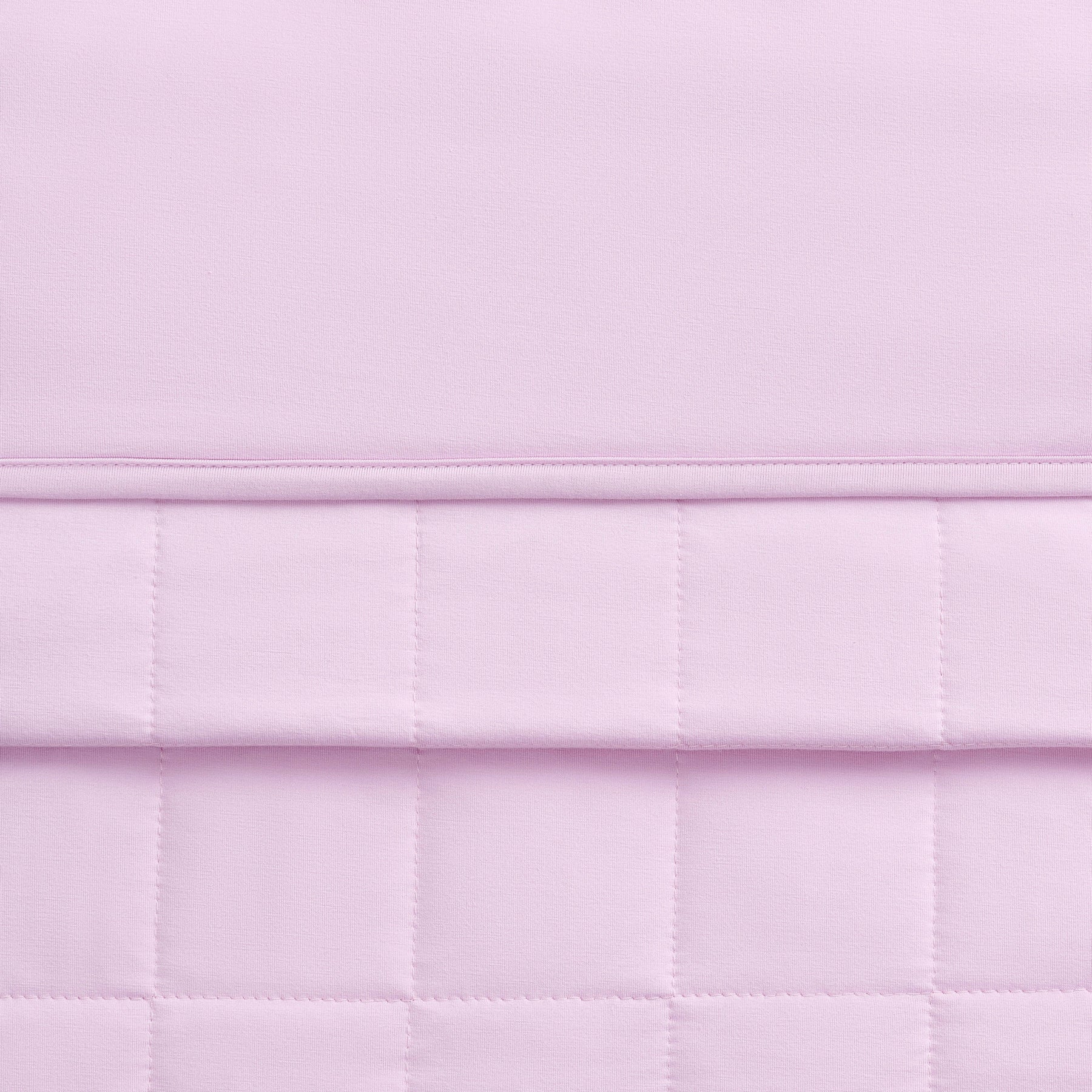 Close-up of a quilted purple blanket