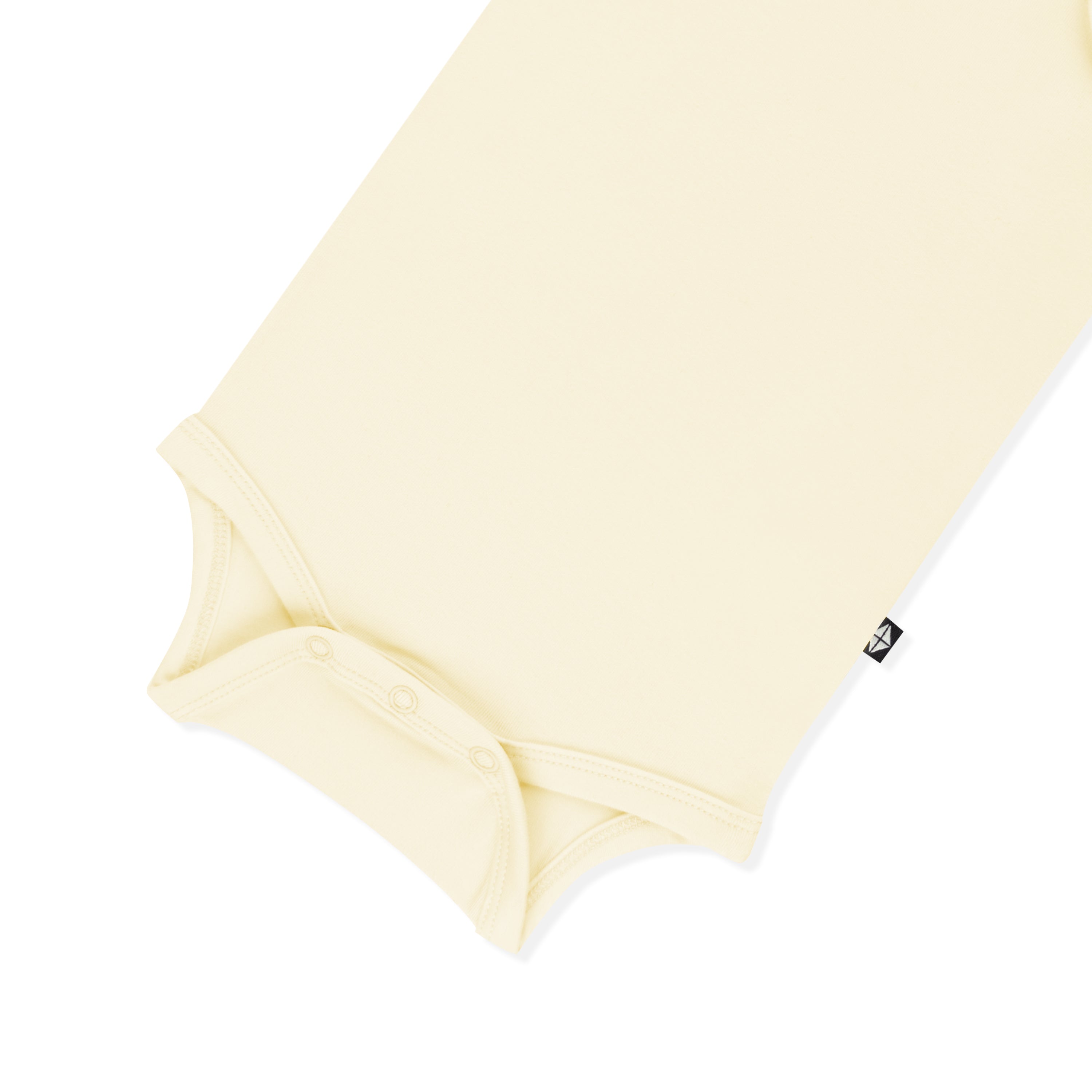 Close up of the snap closures on the Bodysuit in Chamomile