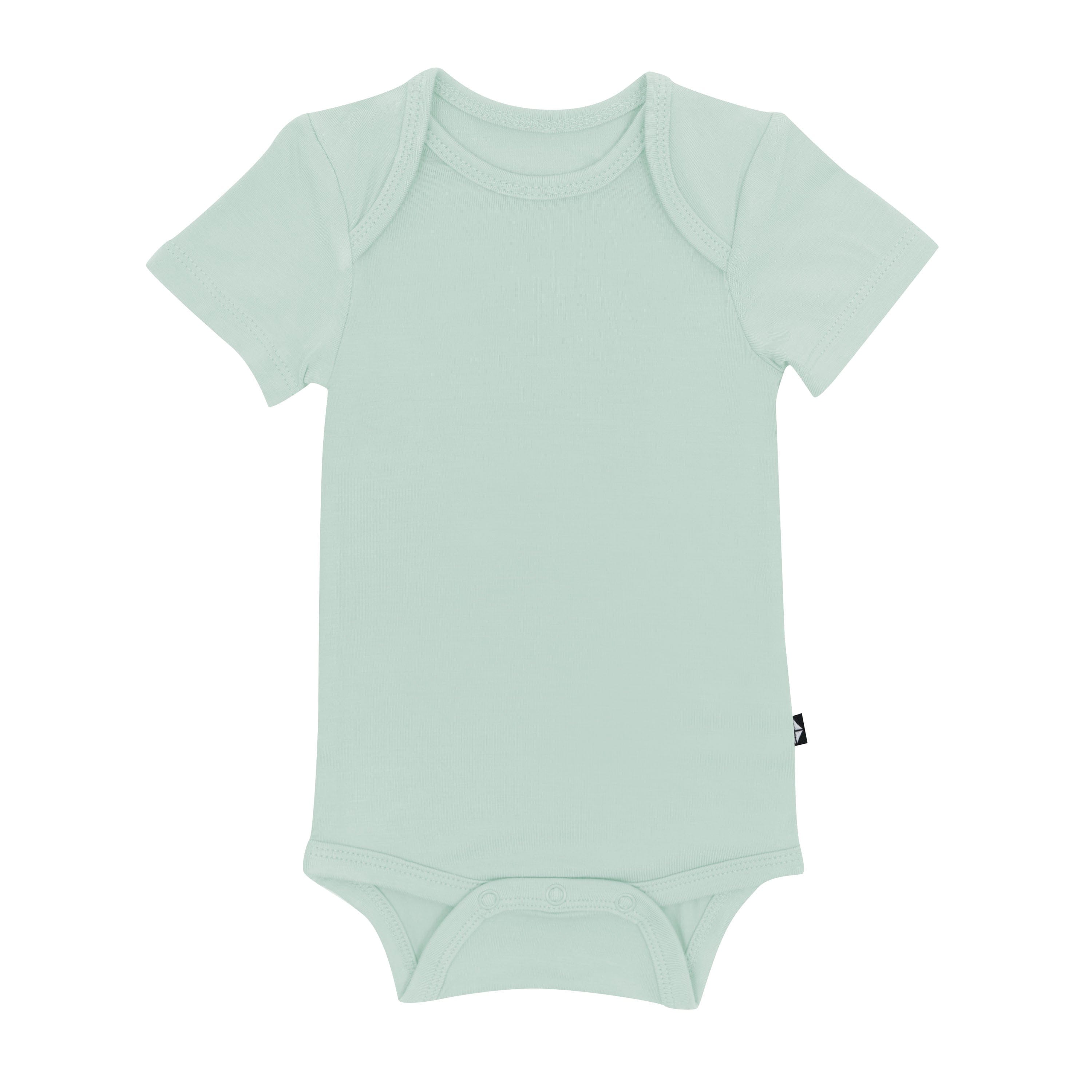Flat lay of Kyte Baby Short Sleeve Bodysuit in Sage
