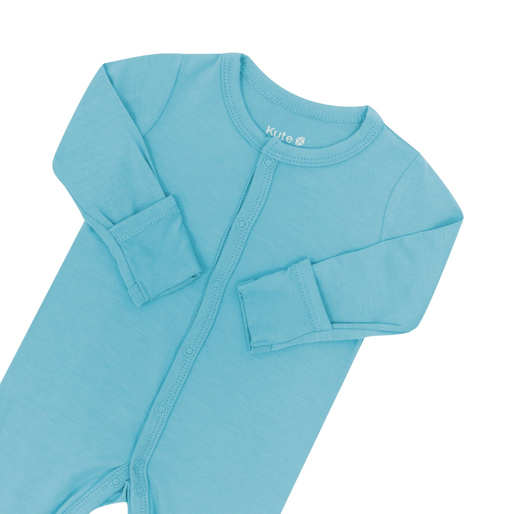 Kyte Baby Snap Romper in Makai showing foldable mittens