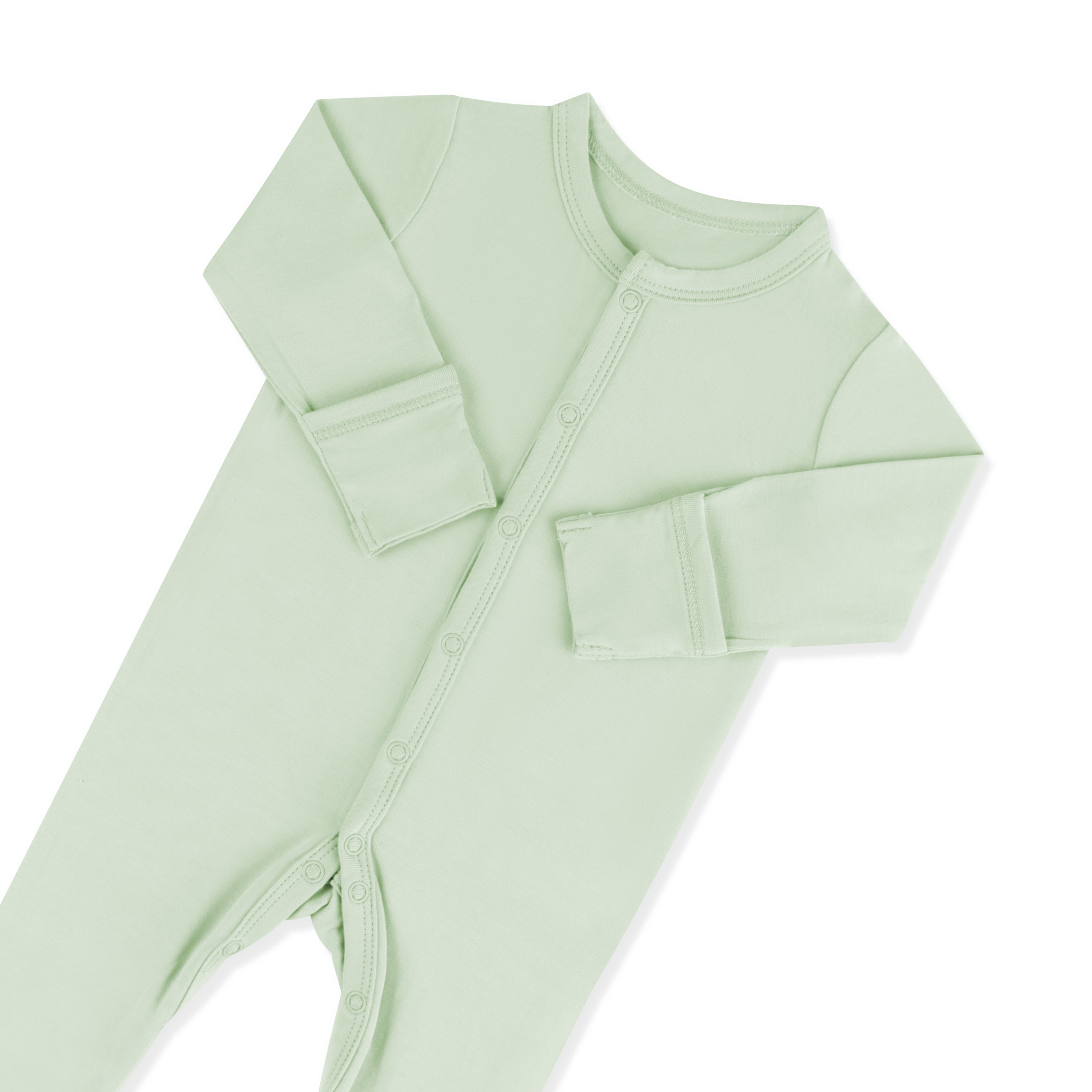 Zipper garage and fold over hand cuffs shown on the Footie in Basil