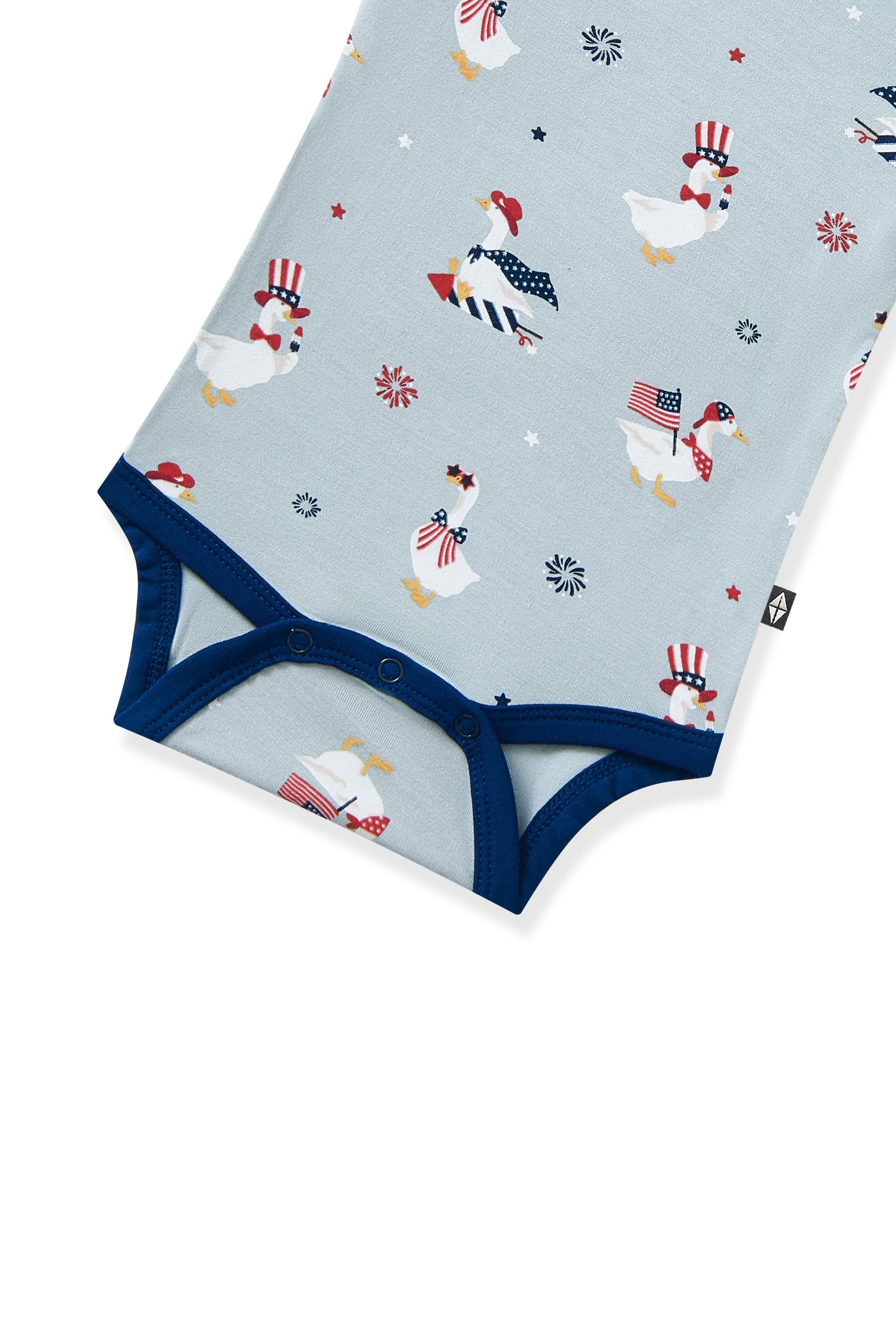 Bottom part of Short sleeve bodysuit in Patriotic Goose print on light blue fabric with navy trim on a white background