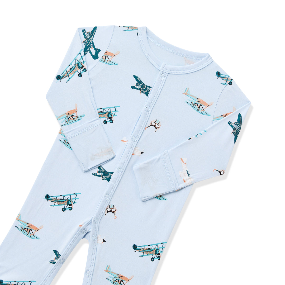 Close up of the snap closure and fold over hand cuffs on the Romper in Take Off