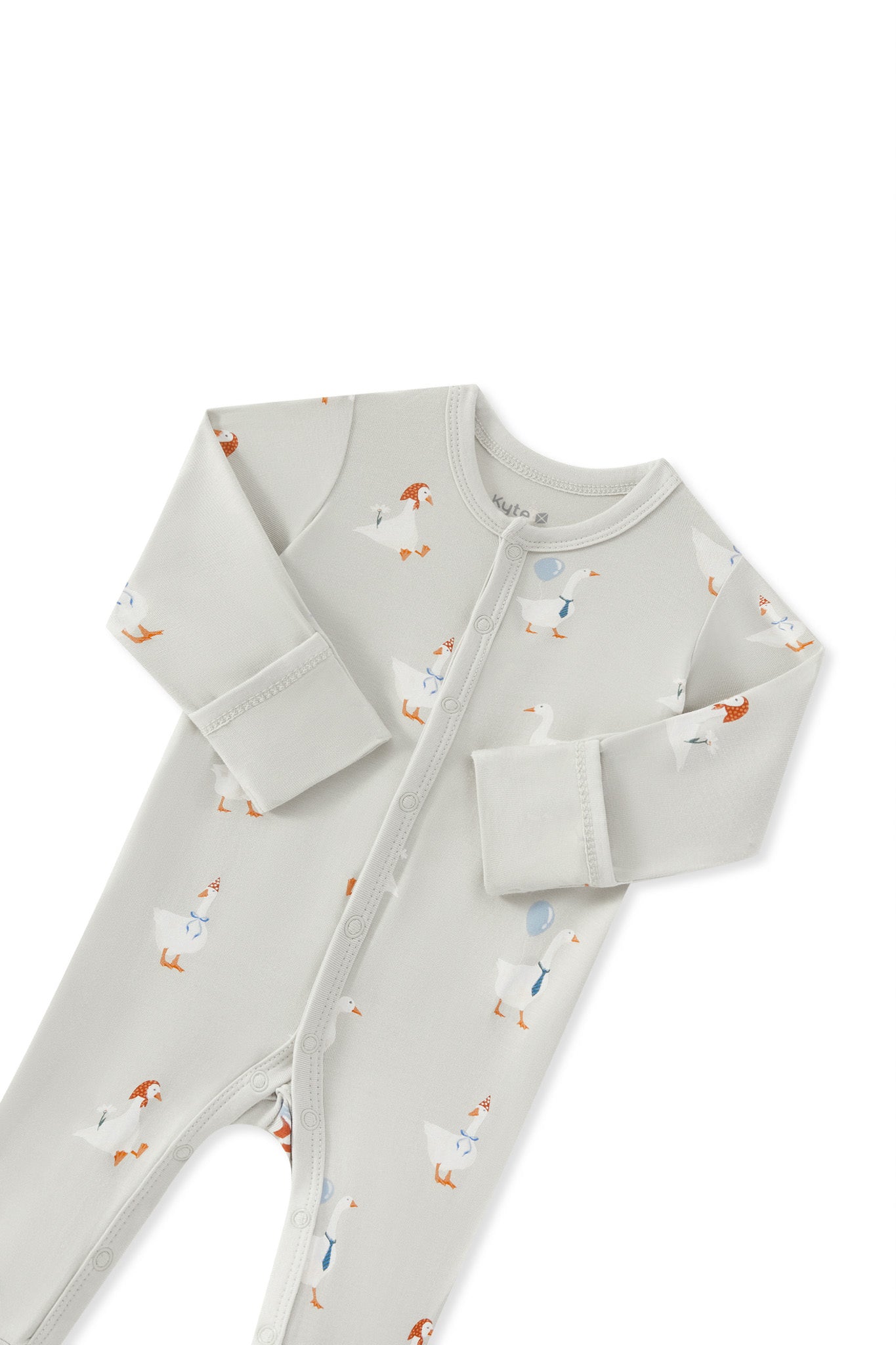 Romper in Oat Silly Goose print with folded sleeves on a white background