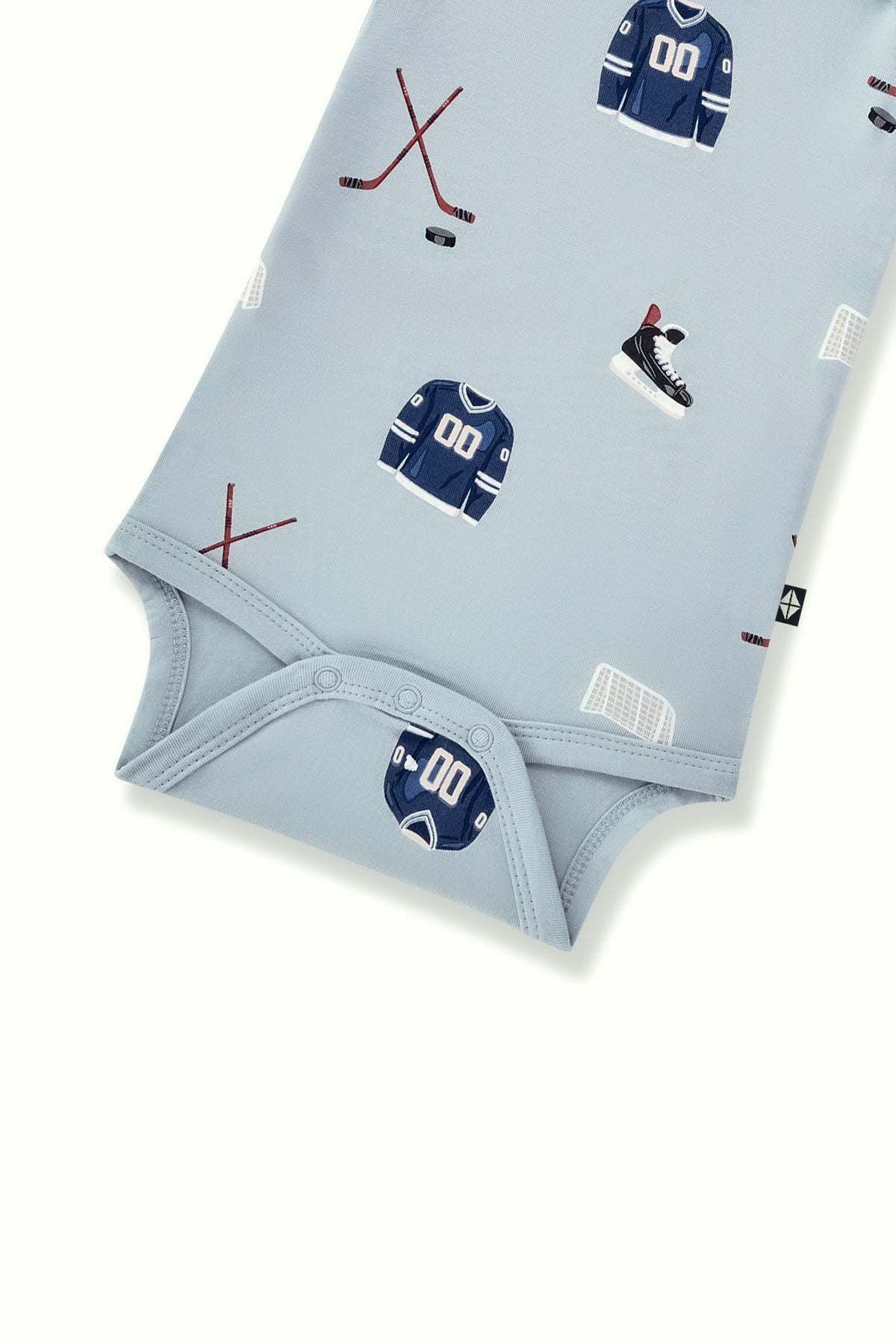 Long Sleeve Bodysuit in Vintage Hockey print with snap buttons on a white background