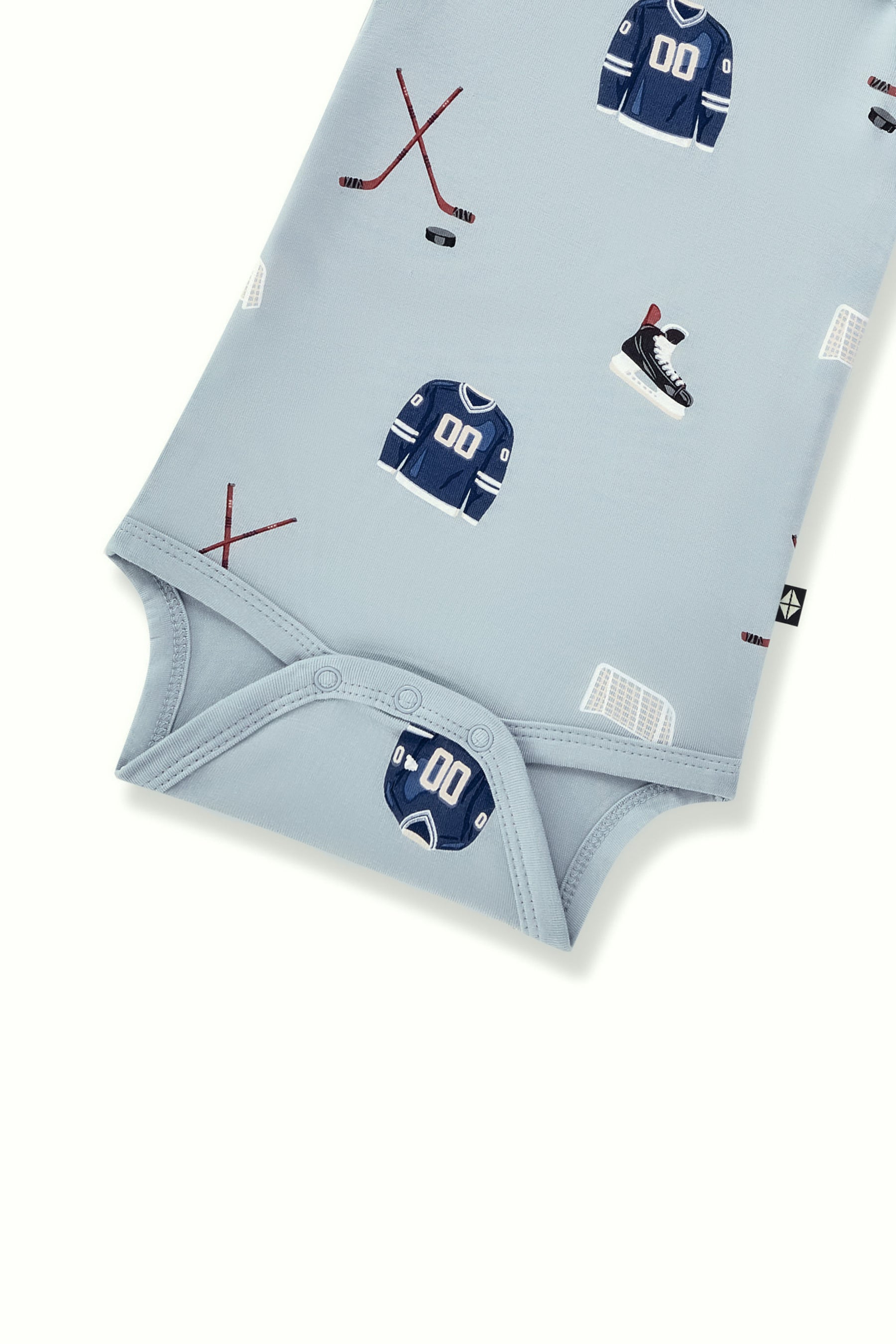 Long Sleeve Bodysuit in Vintage Hockey print with snap buttons on a white background
