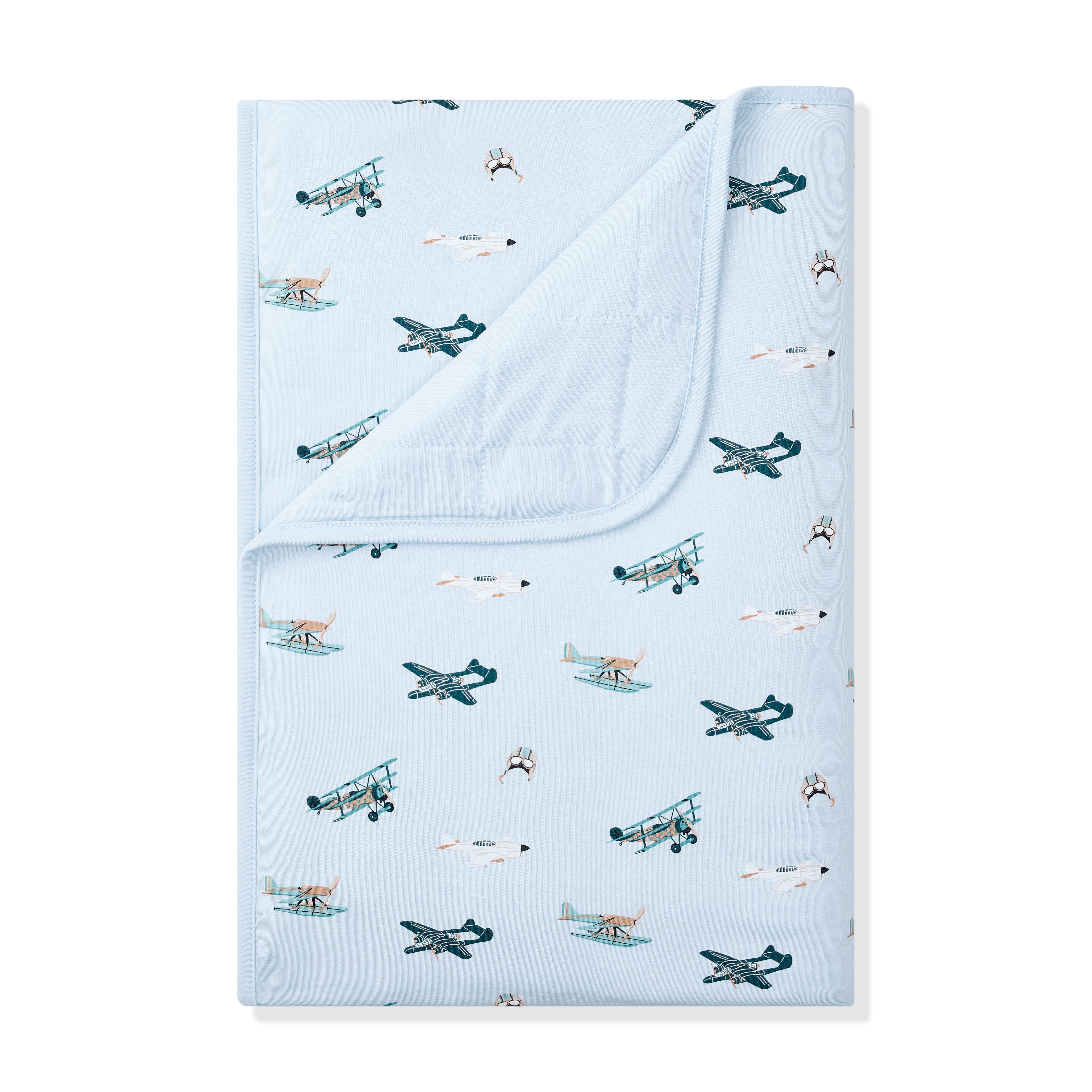 Toddler Blanket in Take Off 1.0 with the corner folded down showing the light blue backing