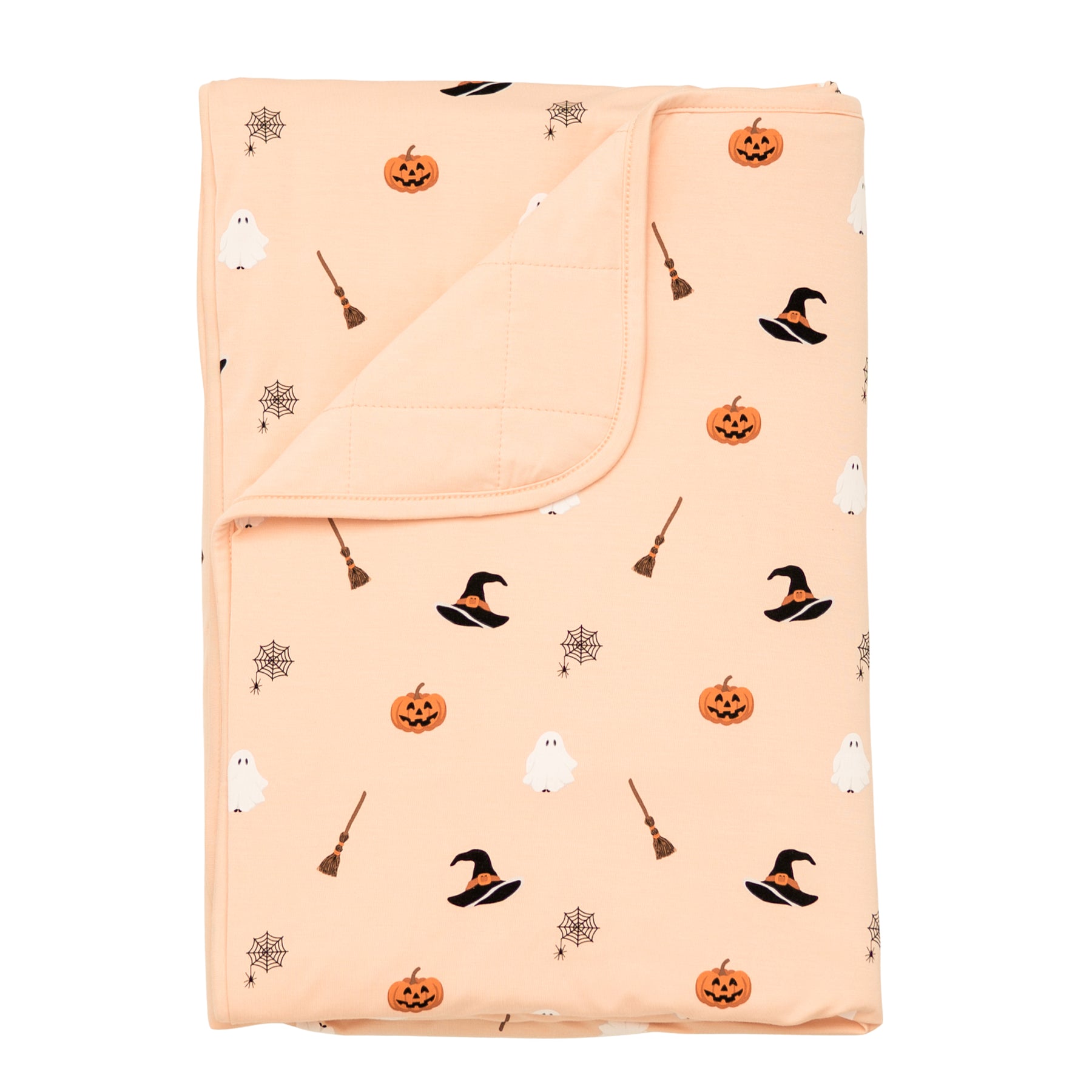 Toddler Blanket in Bewitched 1.0 shown with the corner flipped down showing the Canyon colored backing