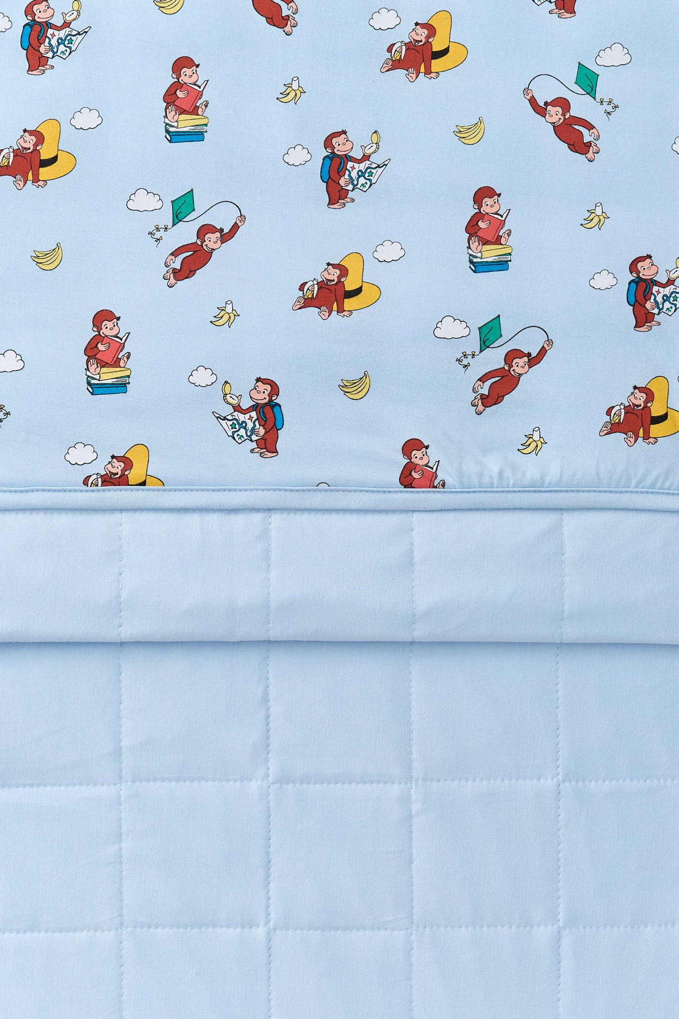 Front and back of Blue Toddler Blanket in Curious George 1.0 print