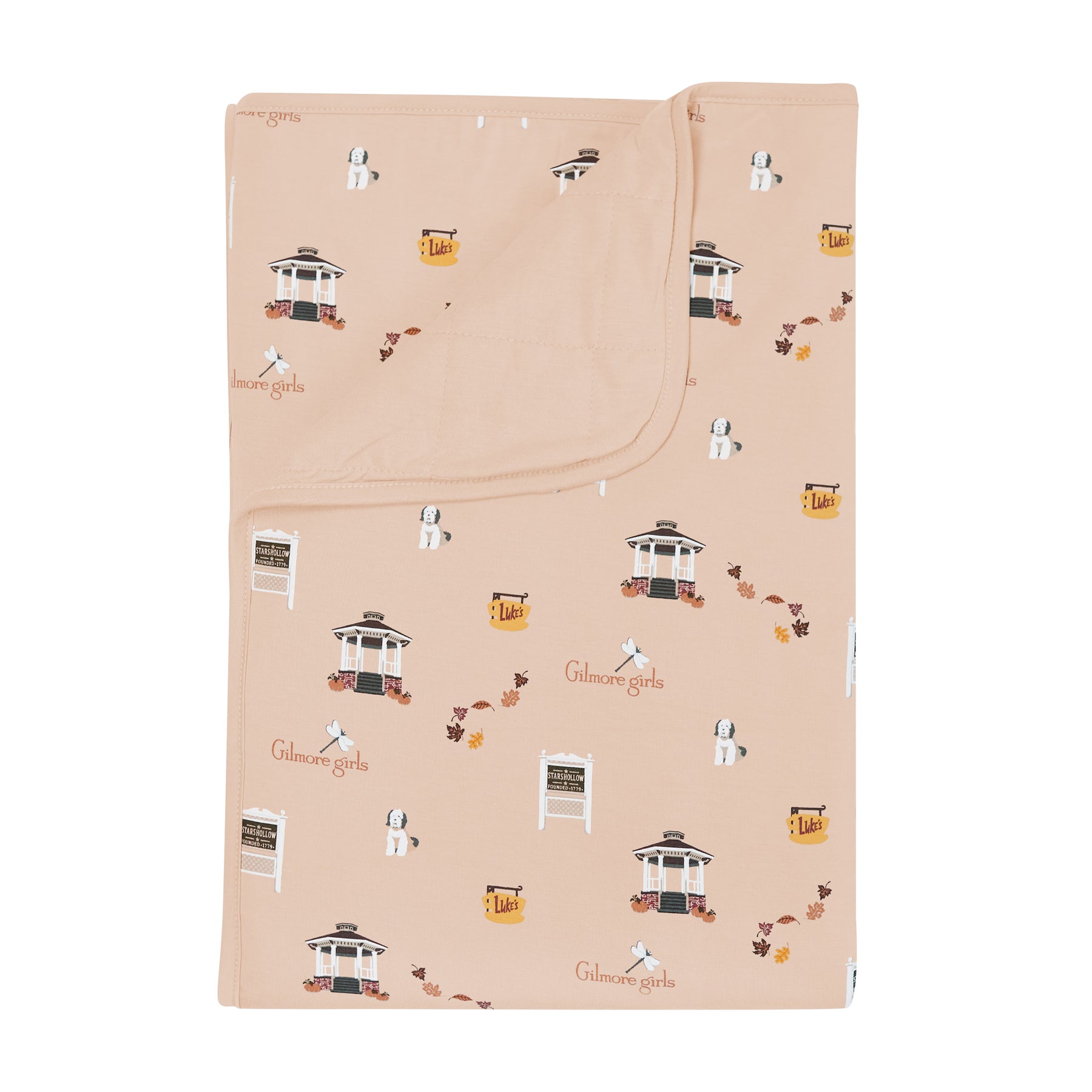 Beige blanket with Gilmore Girls pattern on a white background