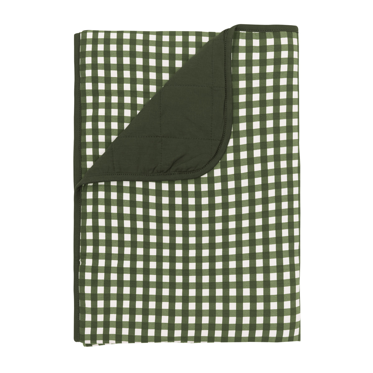 Toddler Blanket in Gingham Fir 1.0 with the corner flipped down showing the Fir backing