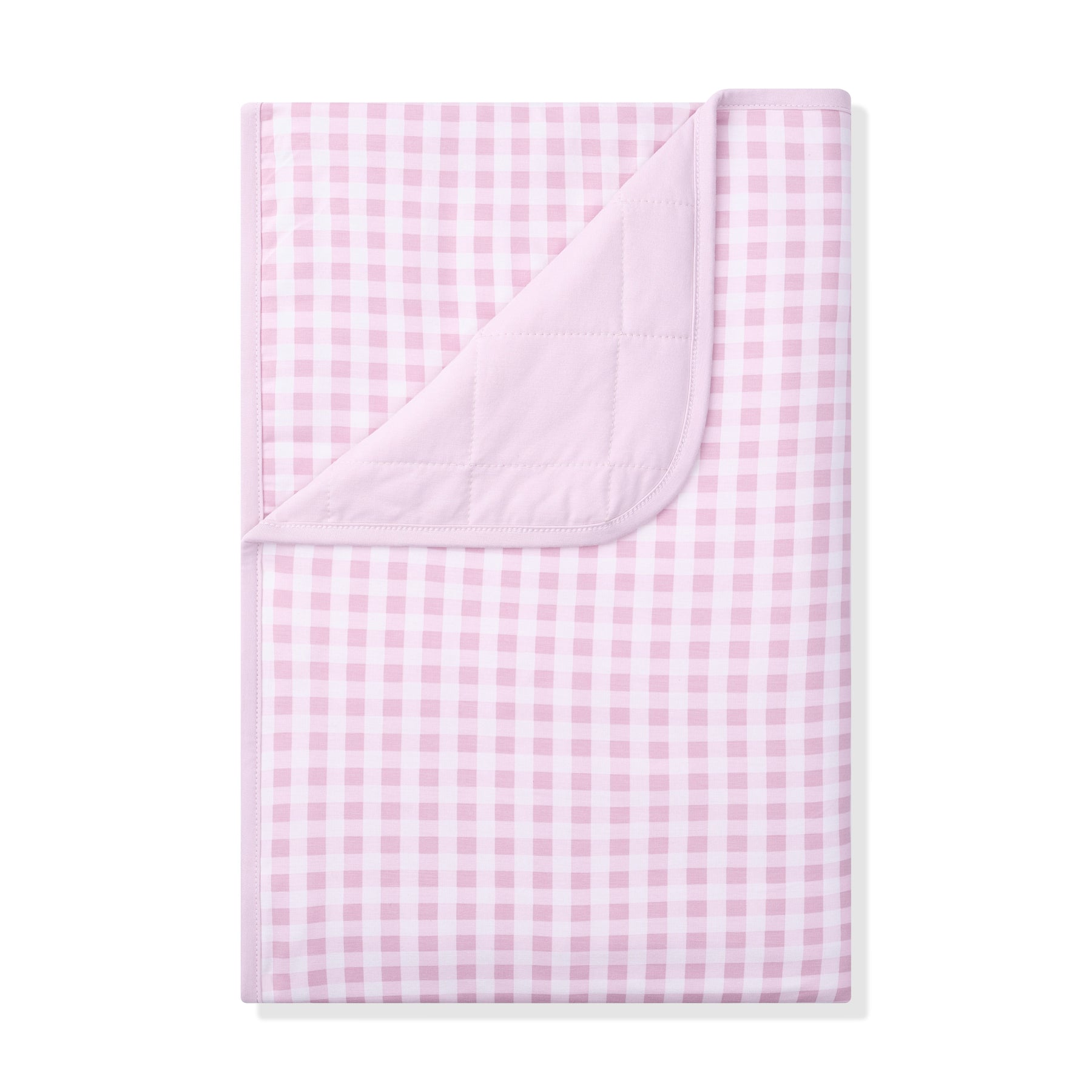 Toddler Blanket in Gingham Thistle 1.0 with the corner flipped down showing the light purple quilted backing