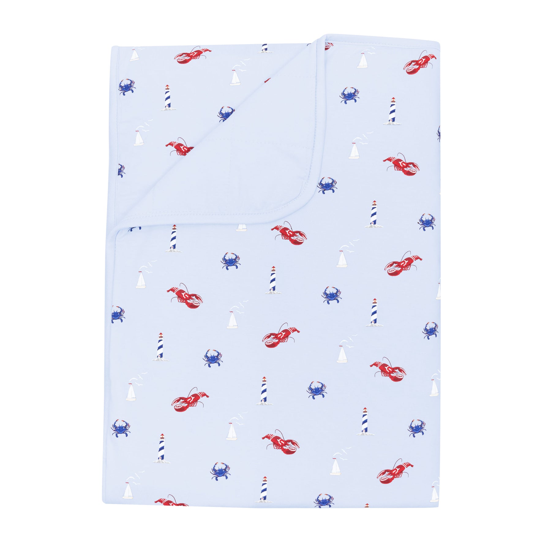 Product photo of the Toddler Blanket in Harbor 1.0 with corner folded down showing the Mist colored backing