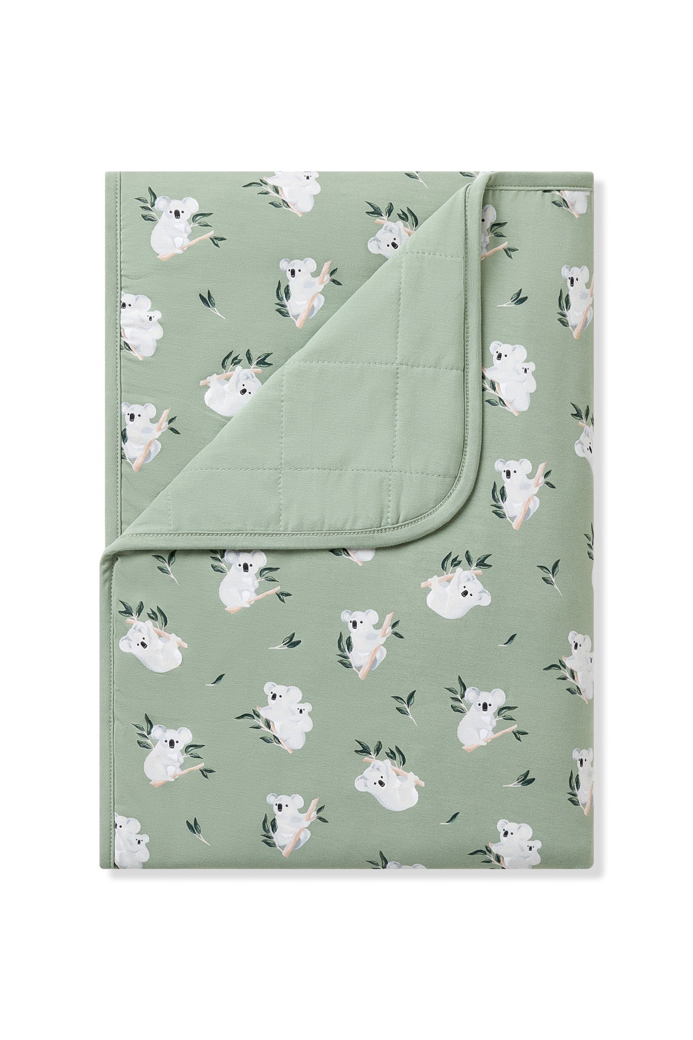 Toddler Blanket in Koala 1.0 with the corner flipped down showing the green quilted backing
