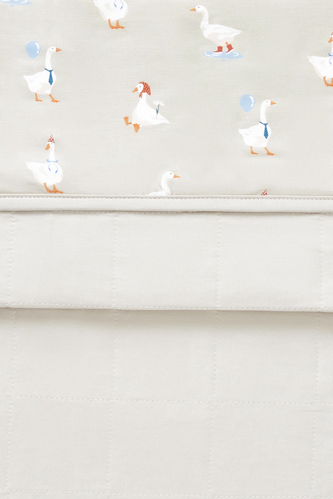Front and back side of Toddler Blanket in Oat Silly Goose 1.0 print