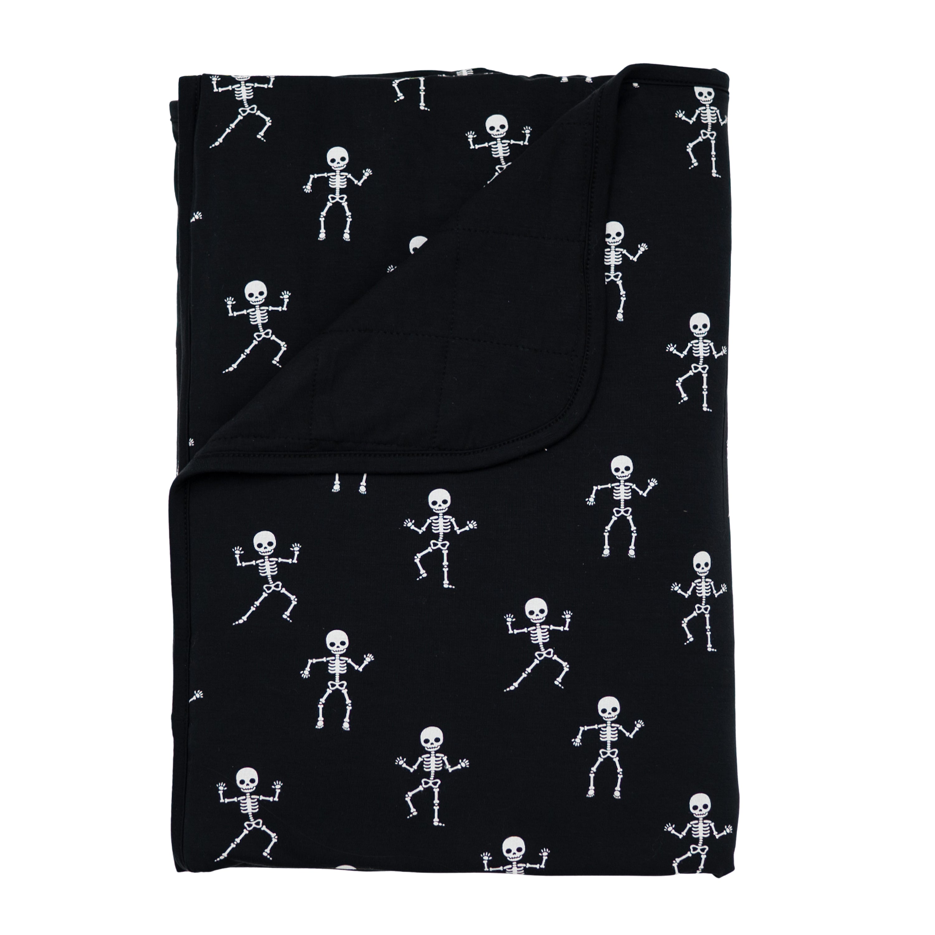 Toddler Blanket in Skeleton 1.0 shown with the corner folded down showing the Midnight colored backing