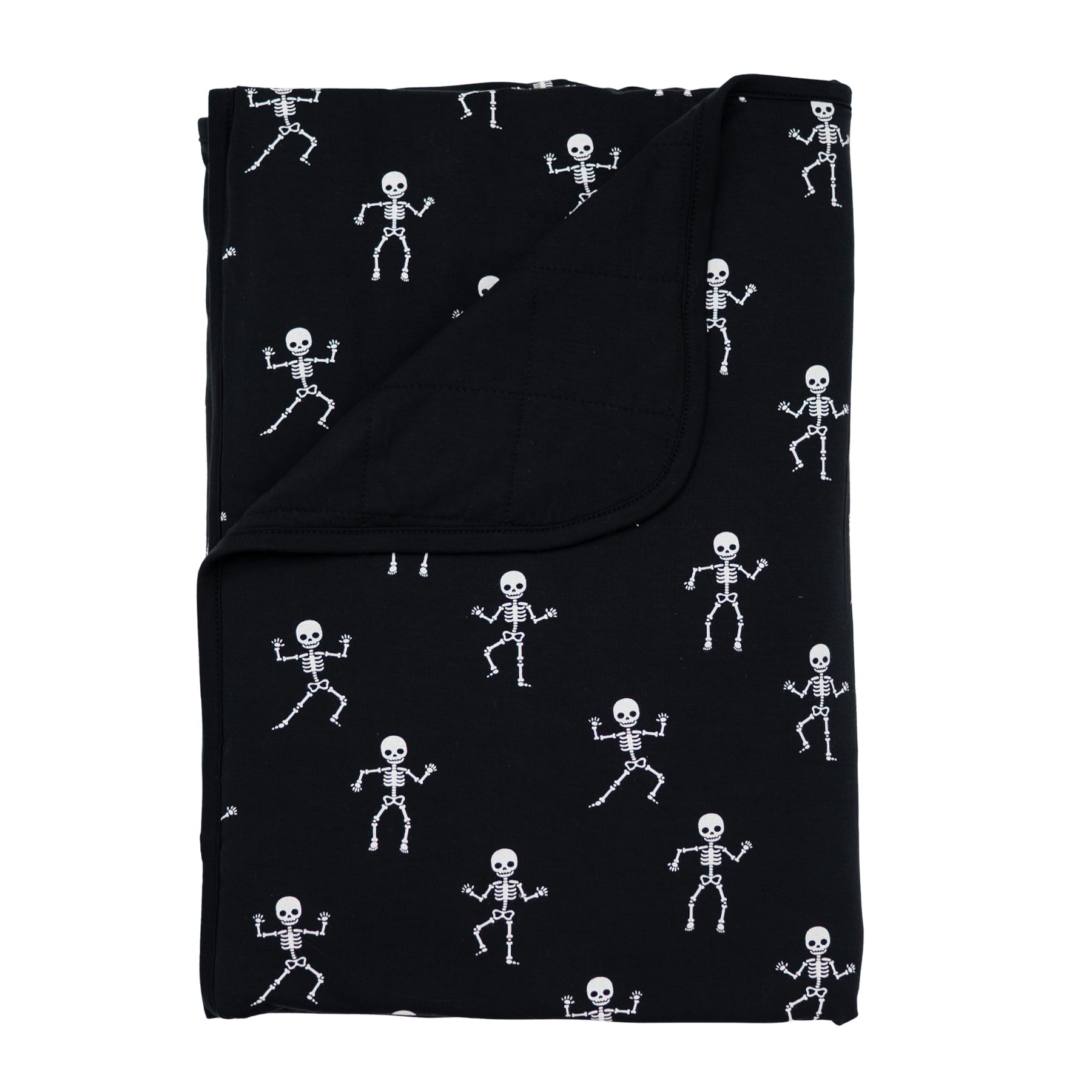 Toddler Blanket in Skeleton 1.0 shown with the corner folded down showing the Midnight colored backing