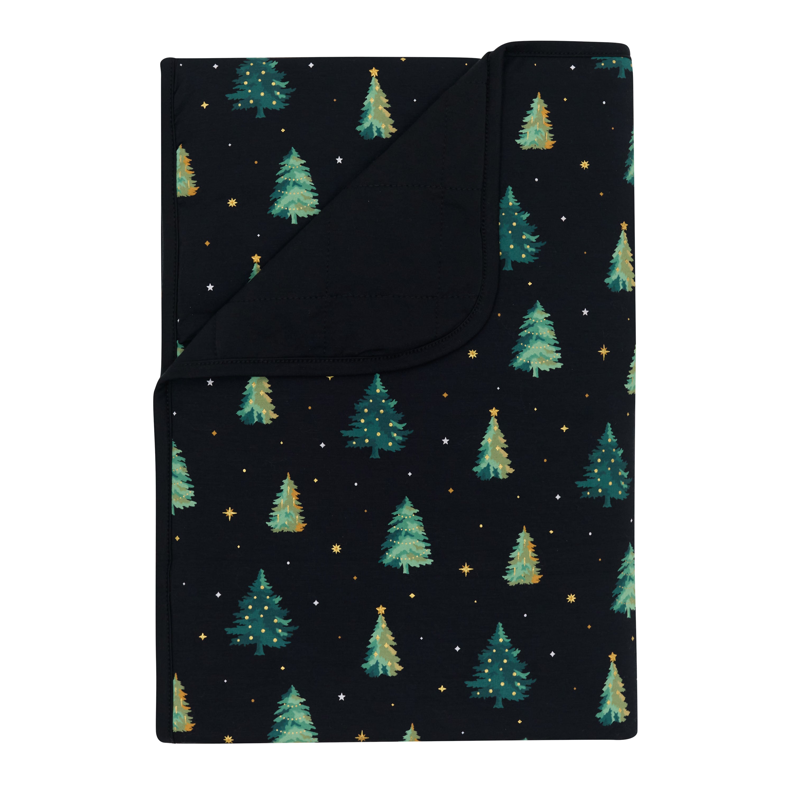 Toddler Blanket in Twinkle Tree 1.0 with the corner flipped down showing the black backing