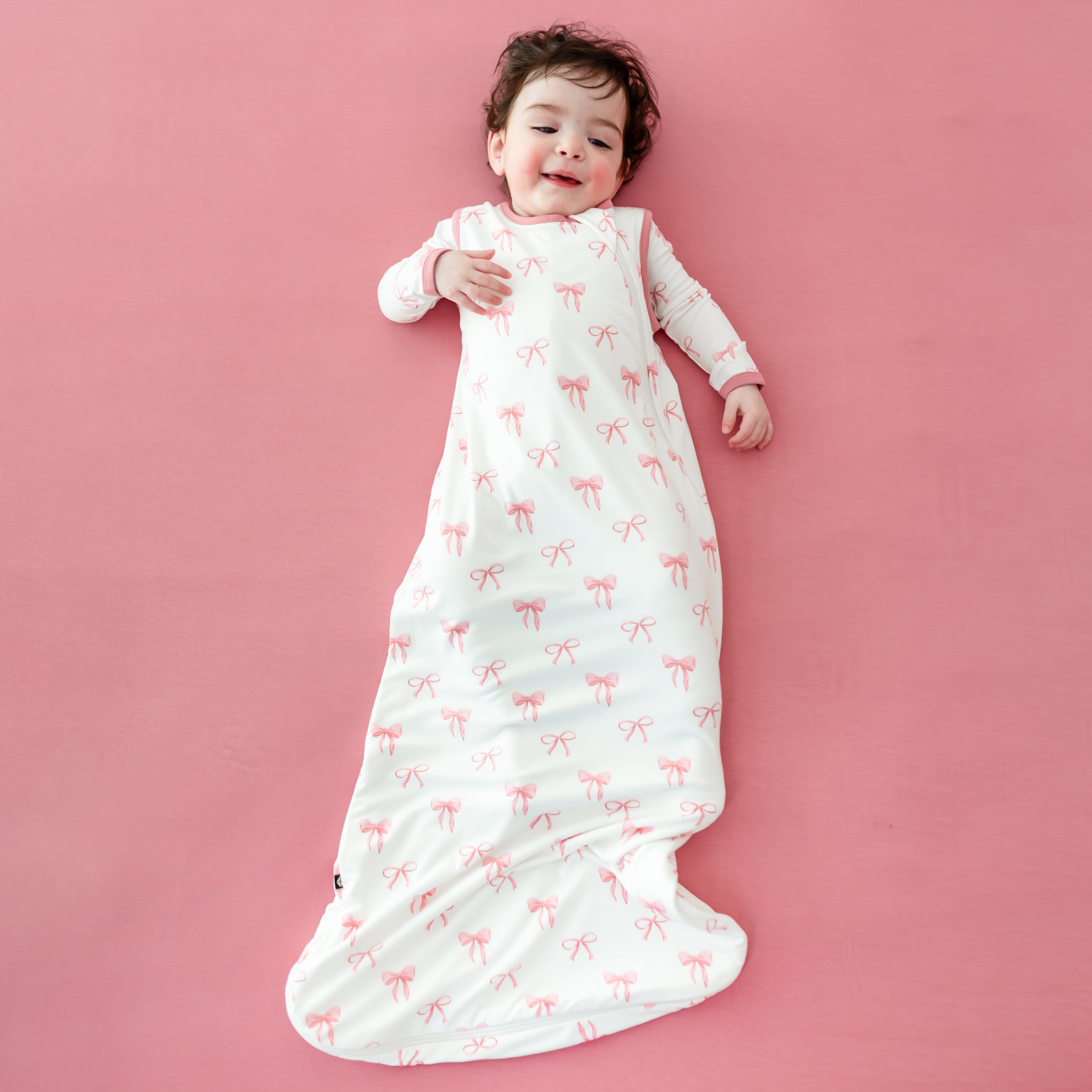 Toddler wearing Sleep Bag in Bow 0.5
