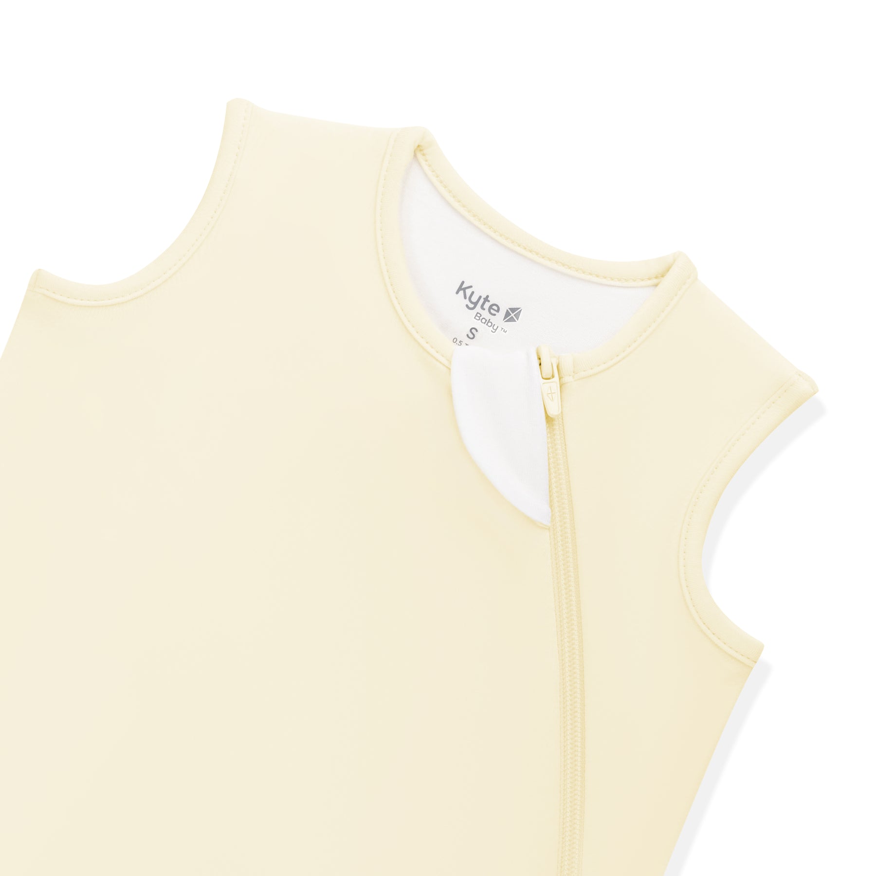 Close up of the zipper garage and top zipper shown on the Sleep Bag in Chamomile 0.5