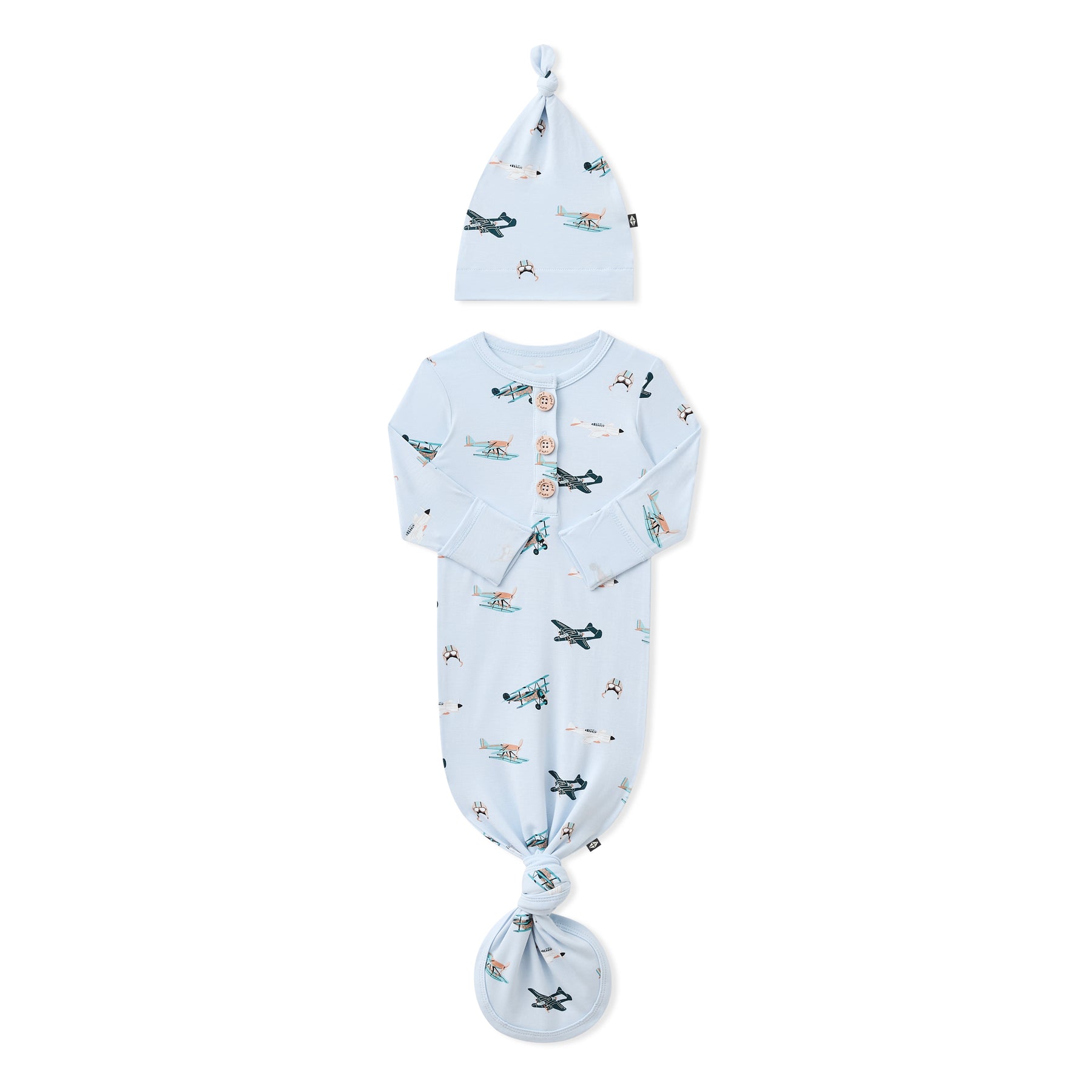 Knotted Gown with Hat Set in Take Off shown with the arms folded inwards