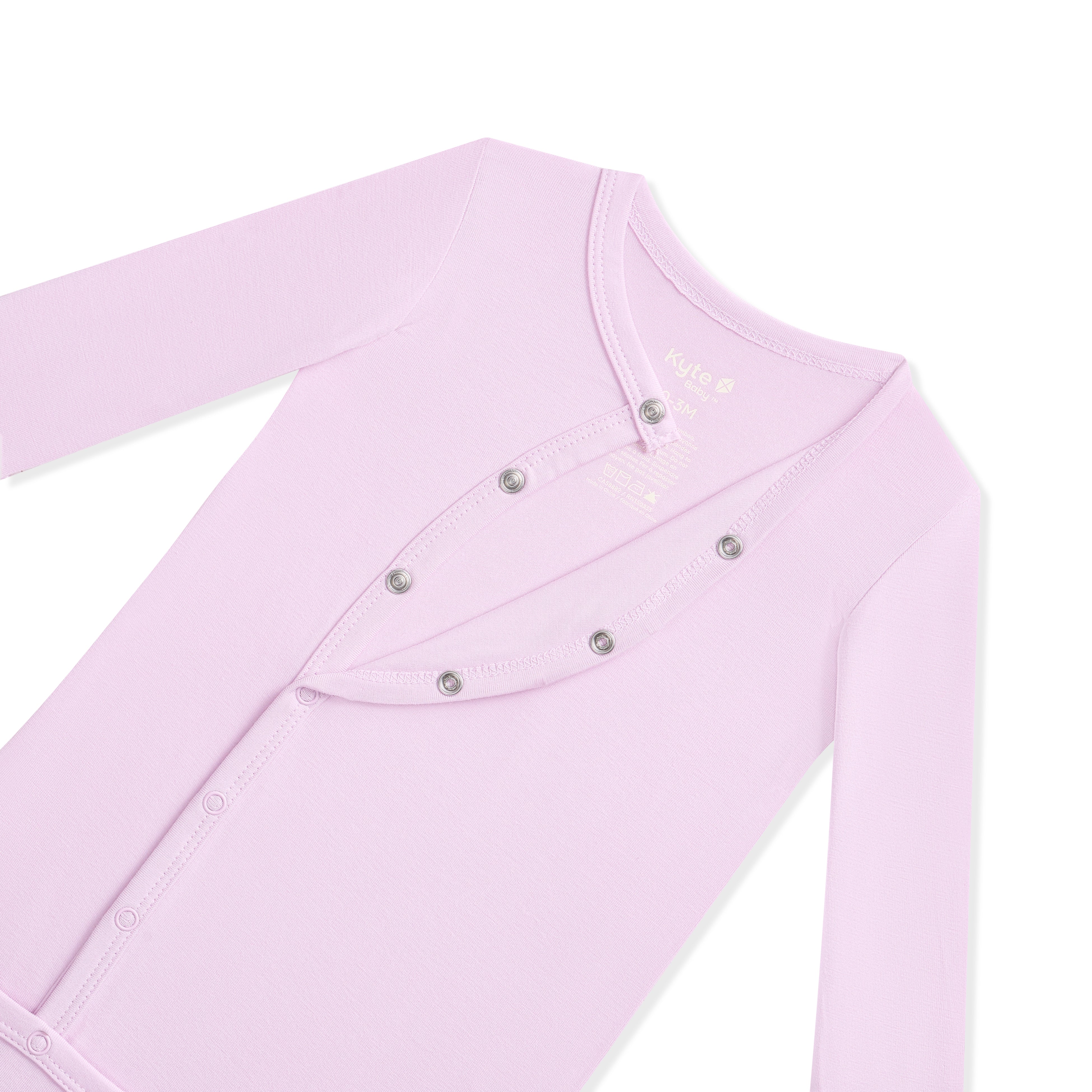 Light purple baby bundler with button details on a white background