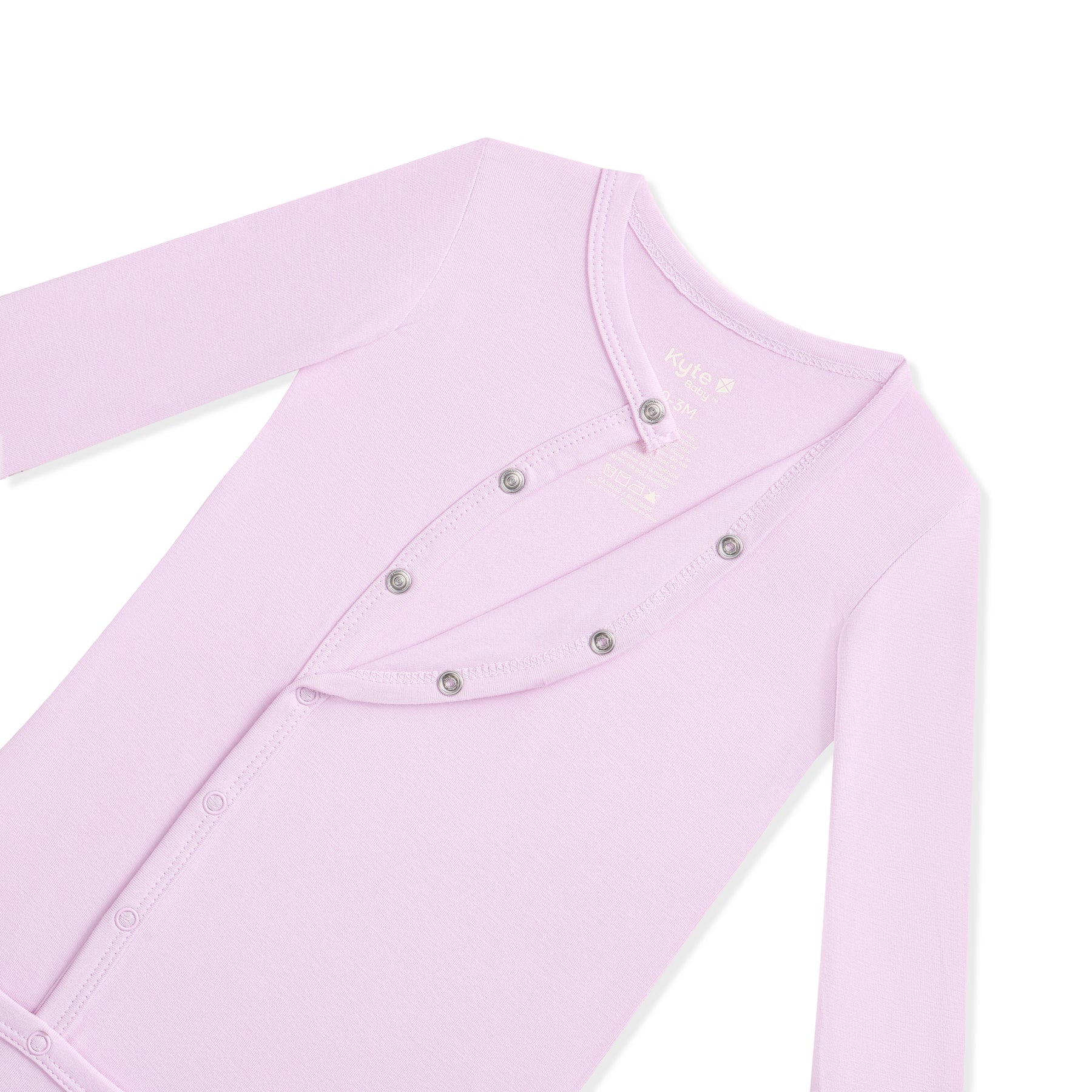 Light purple baby bundler with button details on a white background