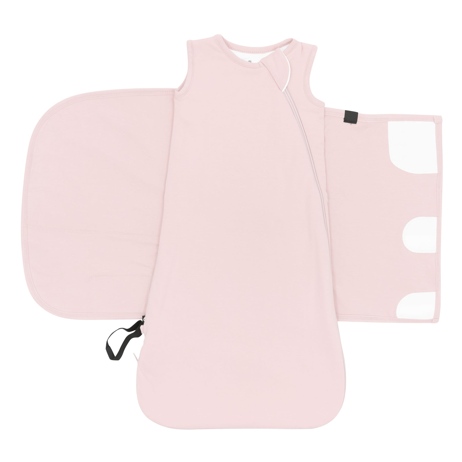 Sleep Bag Swaddler in Blush 1.0 shown unswaddled showing the elastic band on the bottom as well as the adjustable velcro swaddle