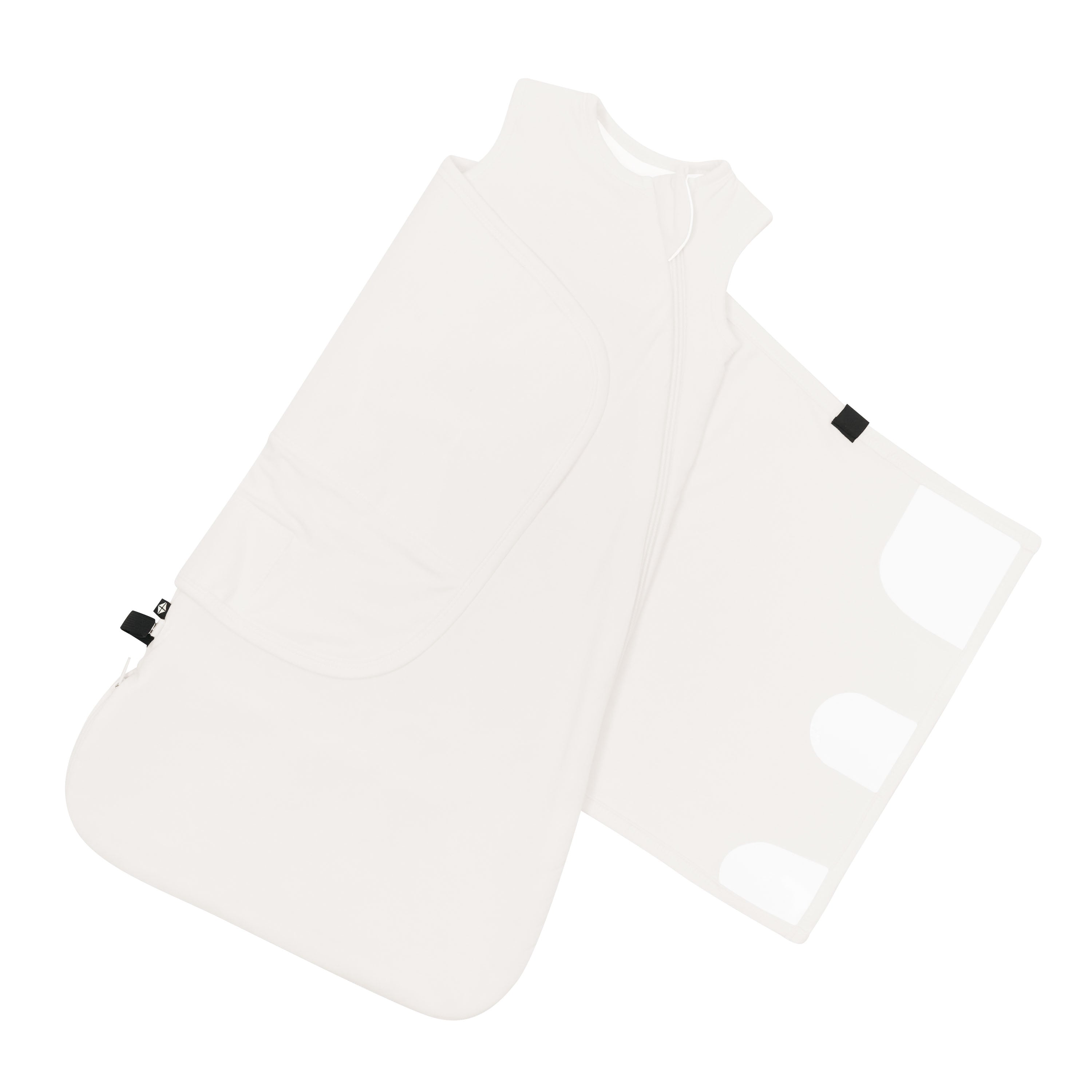 The adjustable velcro swaddle wrap shown on an unswaddled Sleep Bag Swaddler in Cloud 1.0