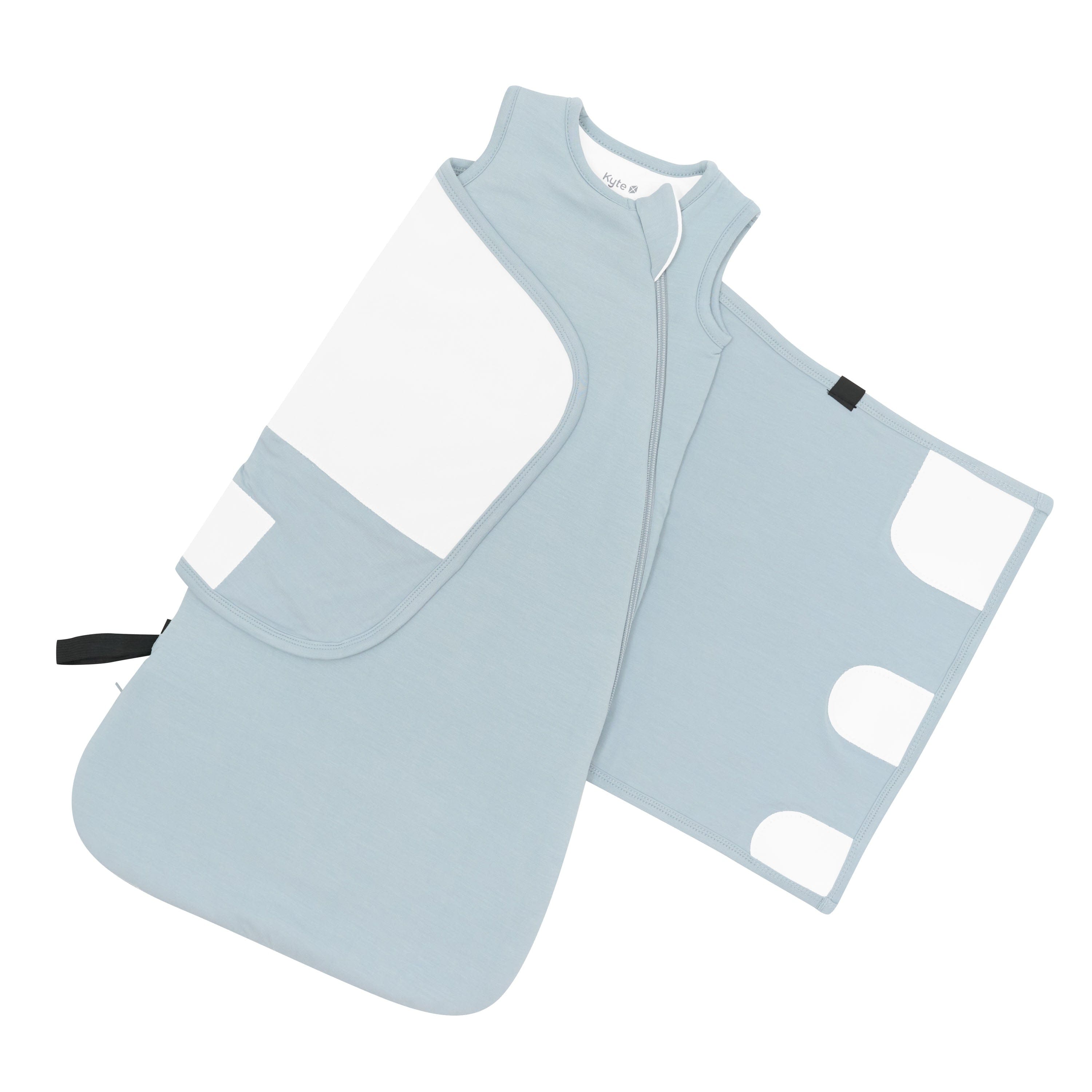 Adjustable velcro swaddle shown on an unswaddled Sleep Bag Swaddler in Fog 1.0