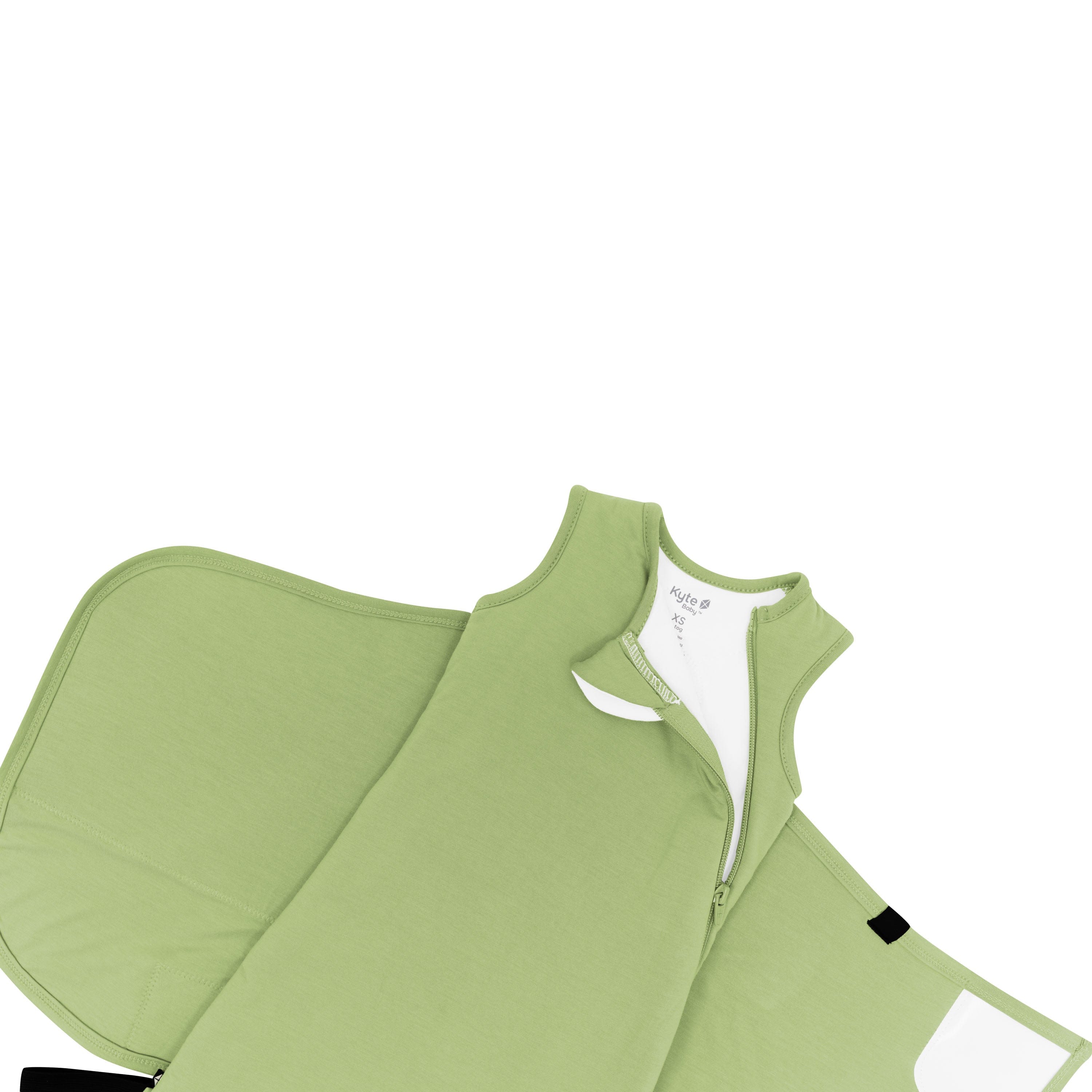 Kyte Baby Sleep Bag Swaddler in Honu shown top unzipped