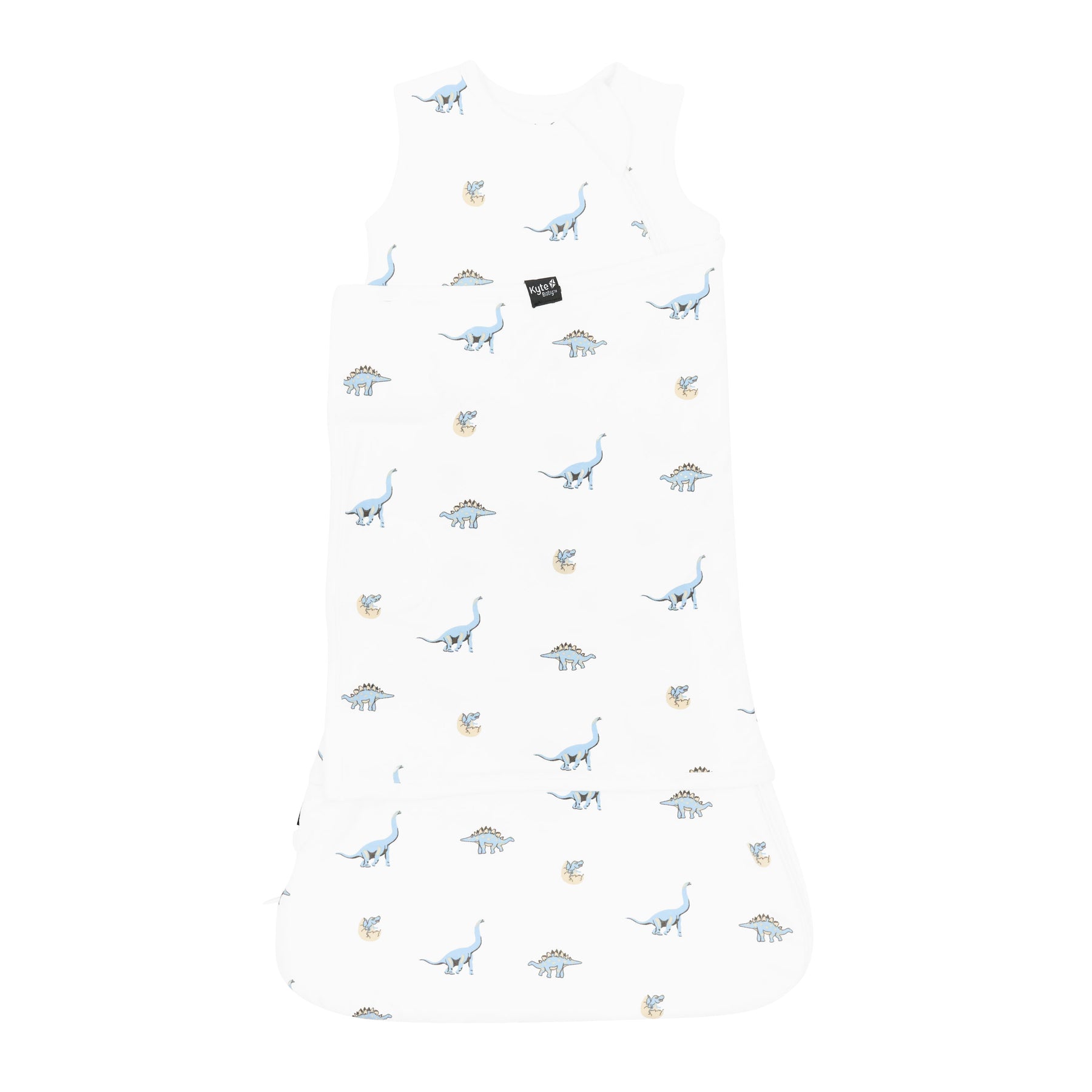 Sleep Bag Swaddler in Jurassic 1.0 shown swaddled with the Black Kyte baby tag visible