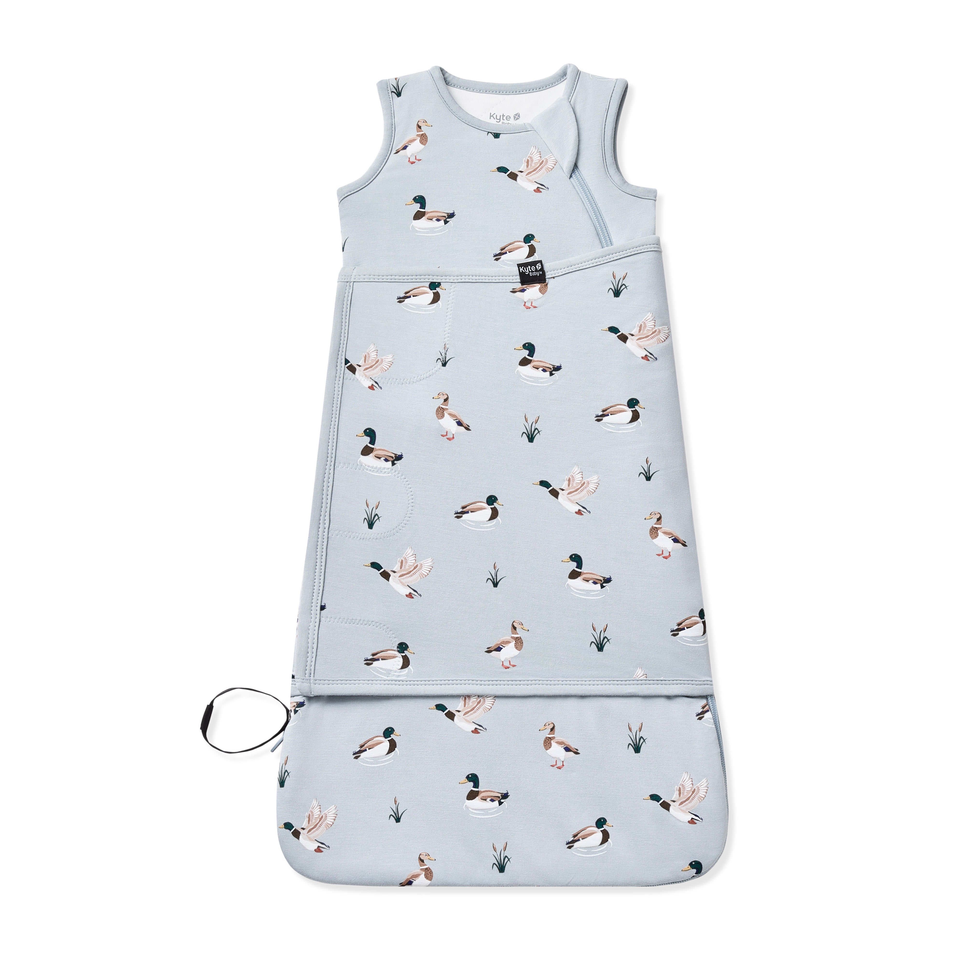 Sleep Bag Swaddler in Mallard Duck 1.0 shown swaddled on a white surface