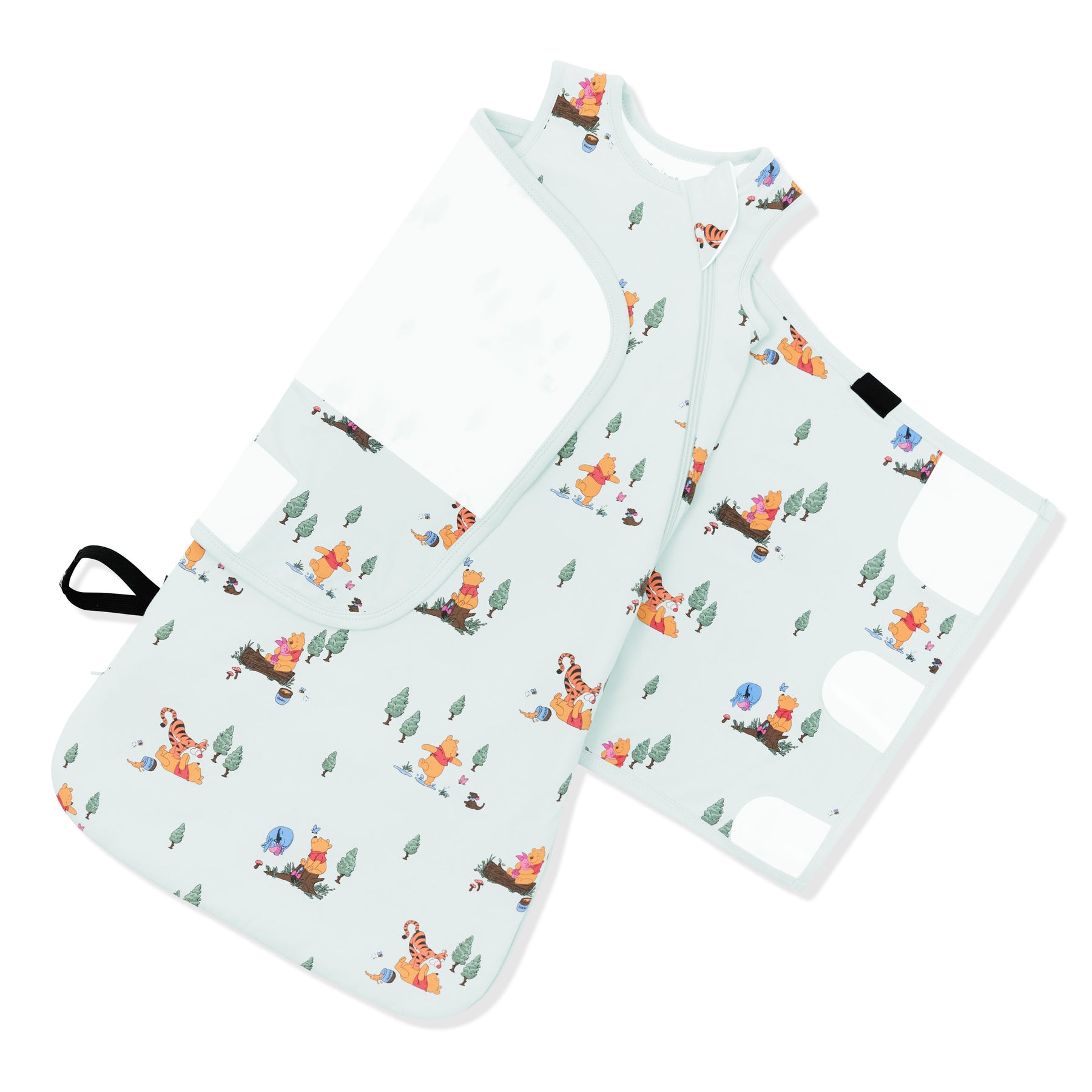 The adjustable swaddle wrap shown on an unswaddled Sleep Bag Swaddler in Winnie the Pooh Hundred Acre Wood 1.0