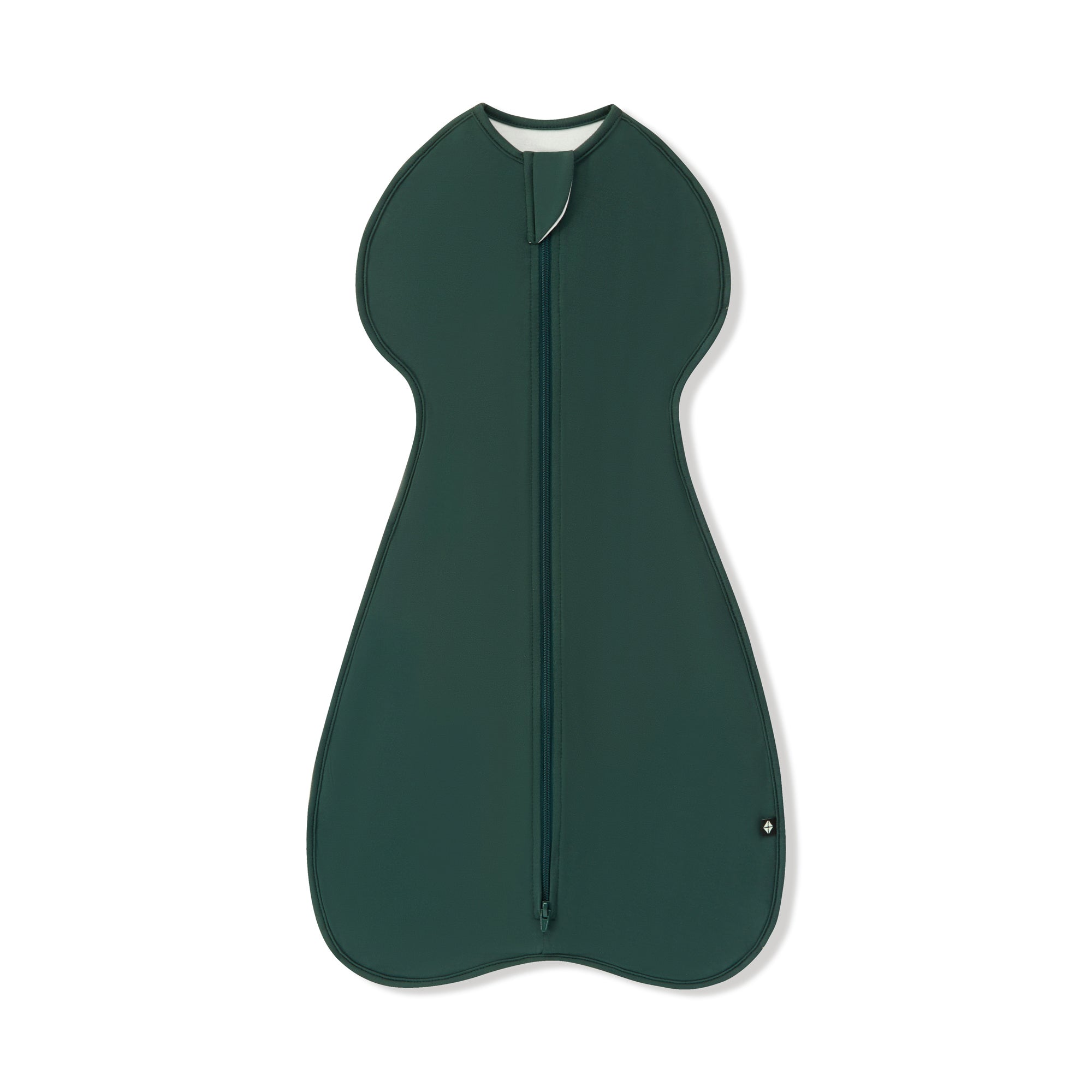 A dark green zippered baby swaddle with a rounded, ergonomic shape, shown flat against a white background.