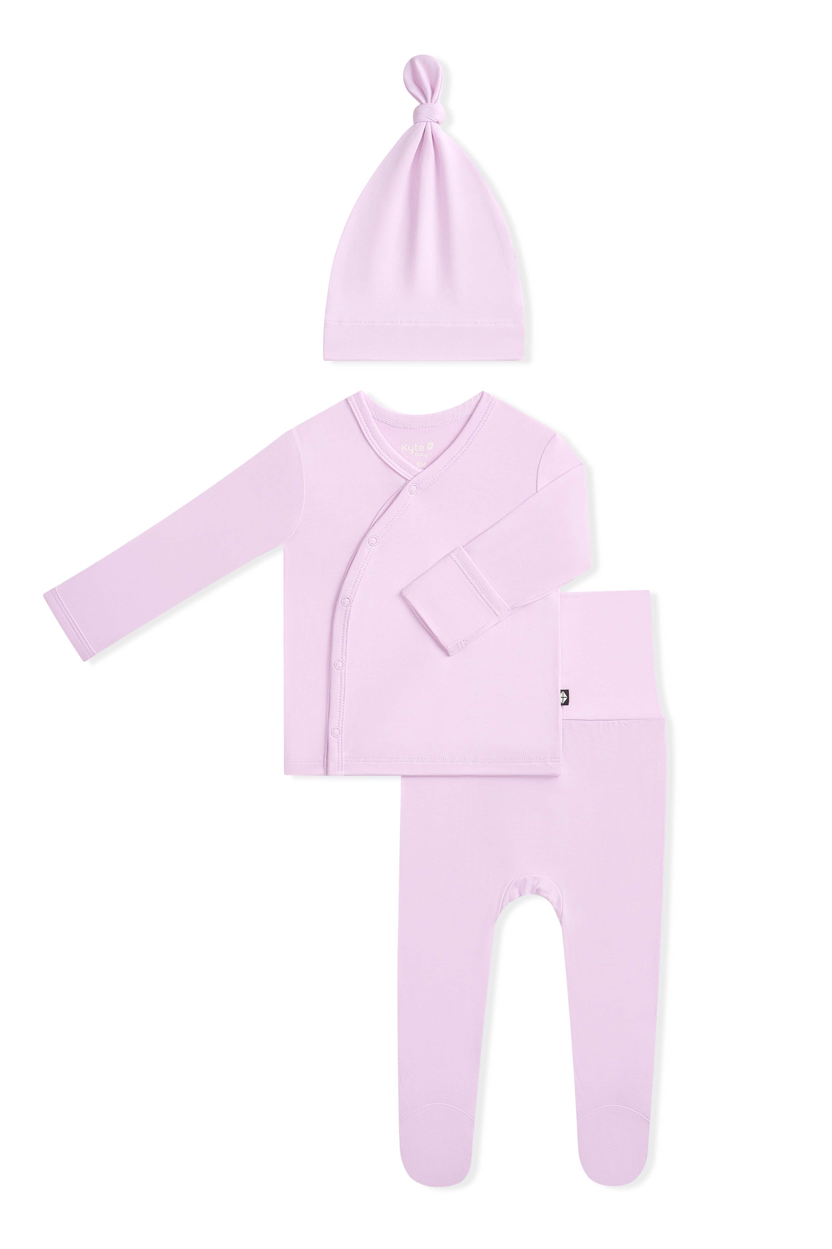 Purple baby outfit set with top, pants, and hat on a white background