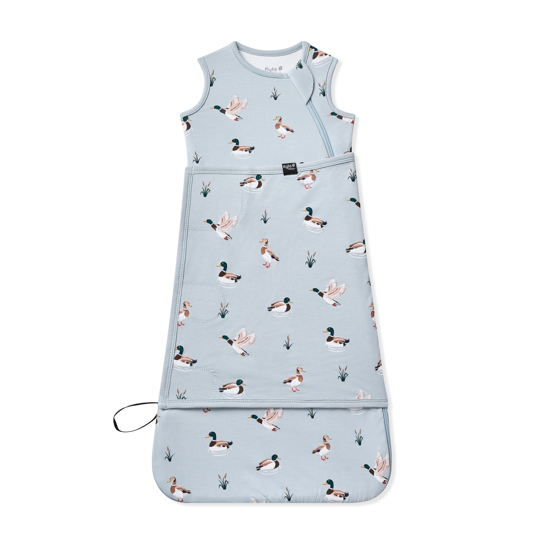 Sleep Bag Swaddler in Mallard Duck 0.5 shown swaddled on a white surface