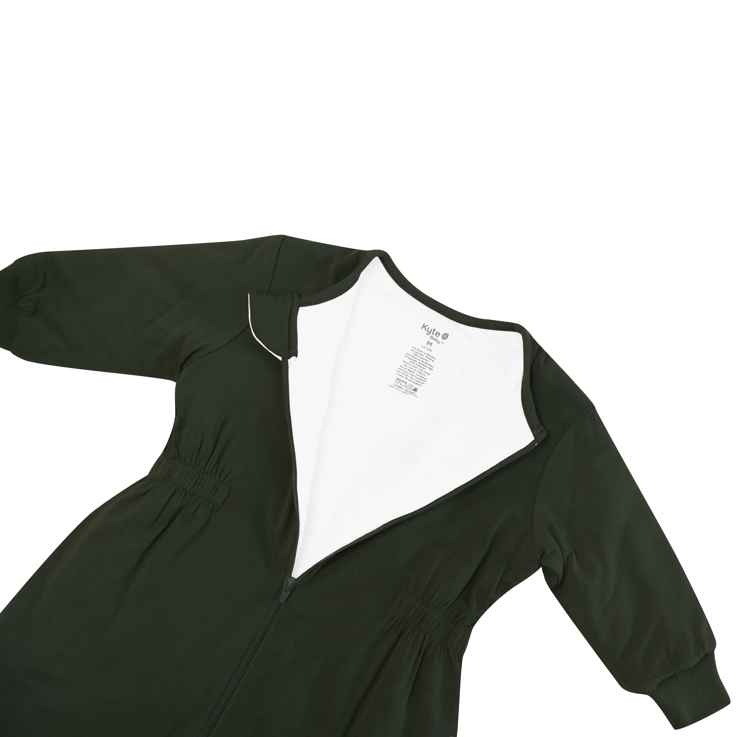 Close up of the zipper garage and top zipper undone on the Cozy Playsuit in Fir