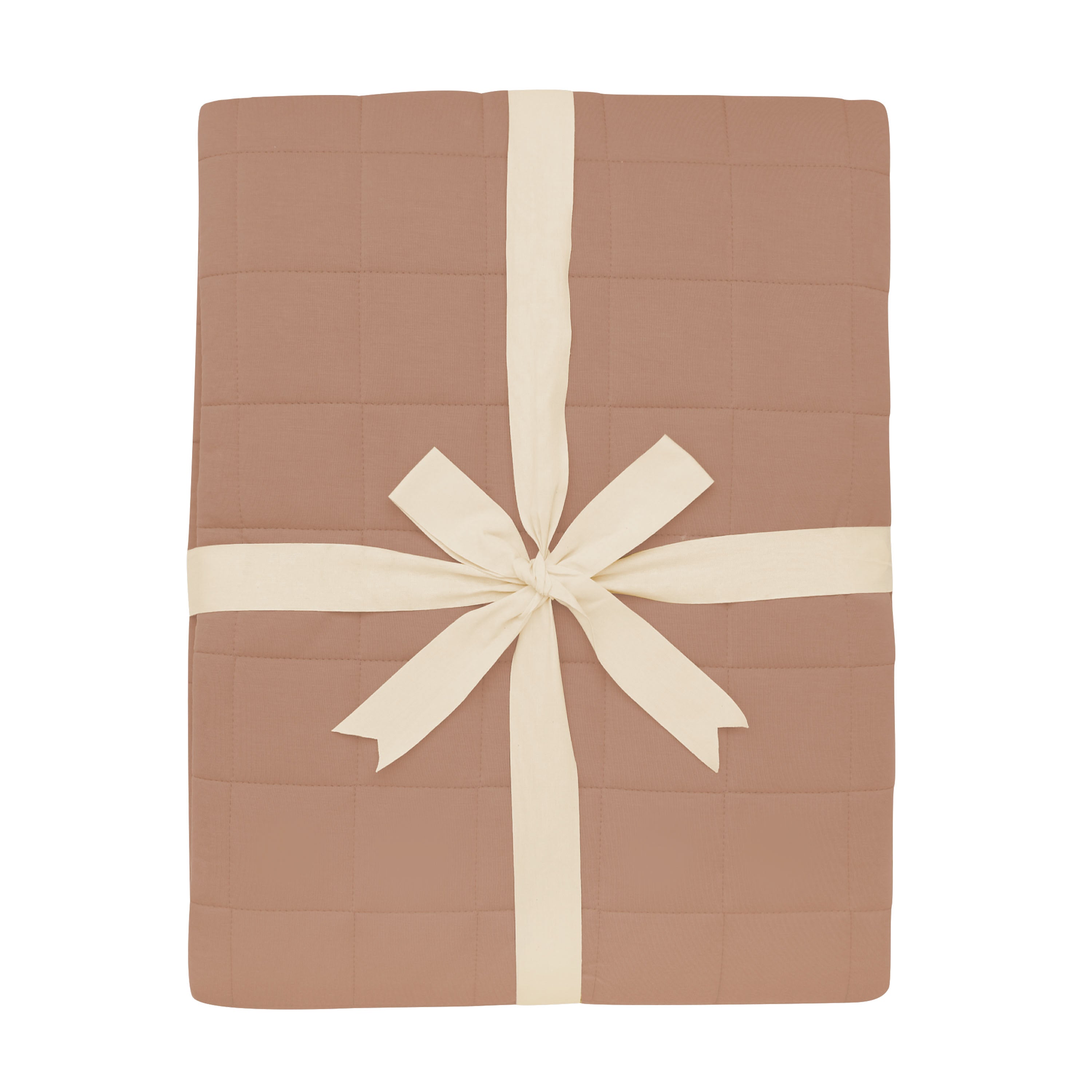 Product photo of the Adult Quilted Blanket in Latte 2.5 shown wrapped in its packaging