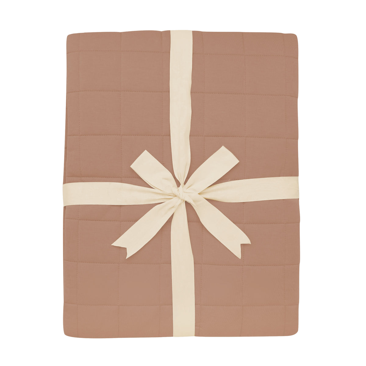 Product photo of the Adult Quilted Blanket in Latte 2.5 shown wrapped in its packaging