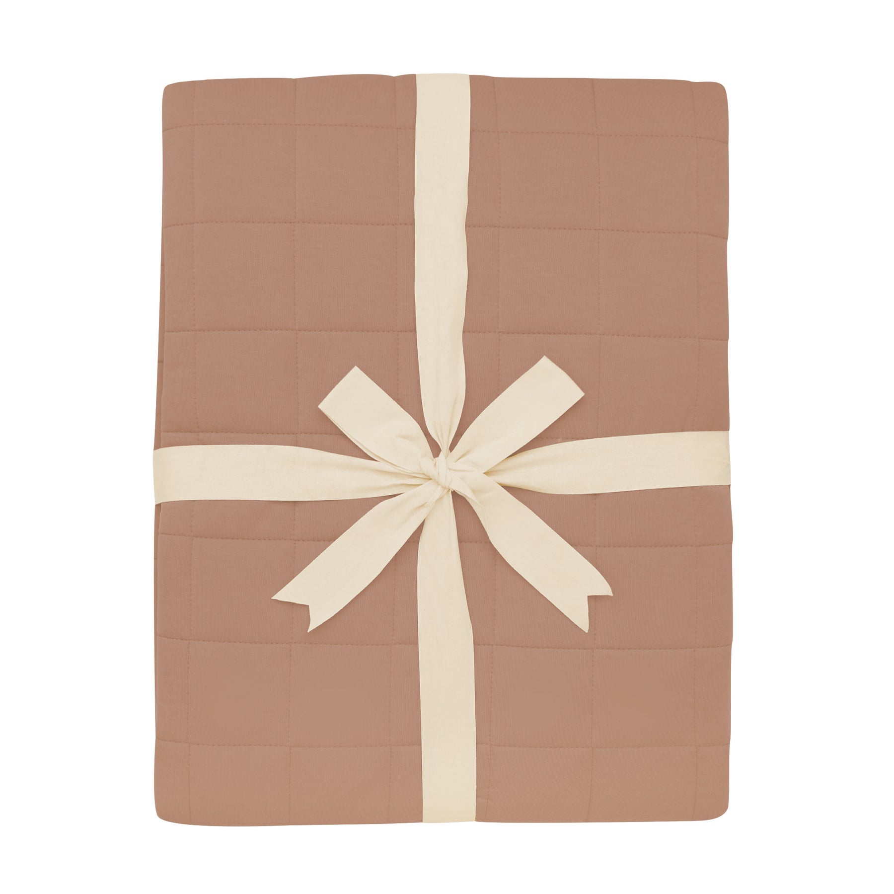 Product photo of the Adult Quilted Blanket in Latte 2.5 shown wrapped in its packaging