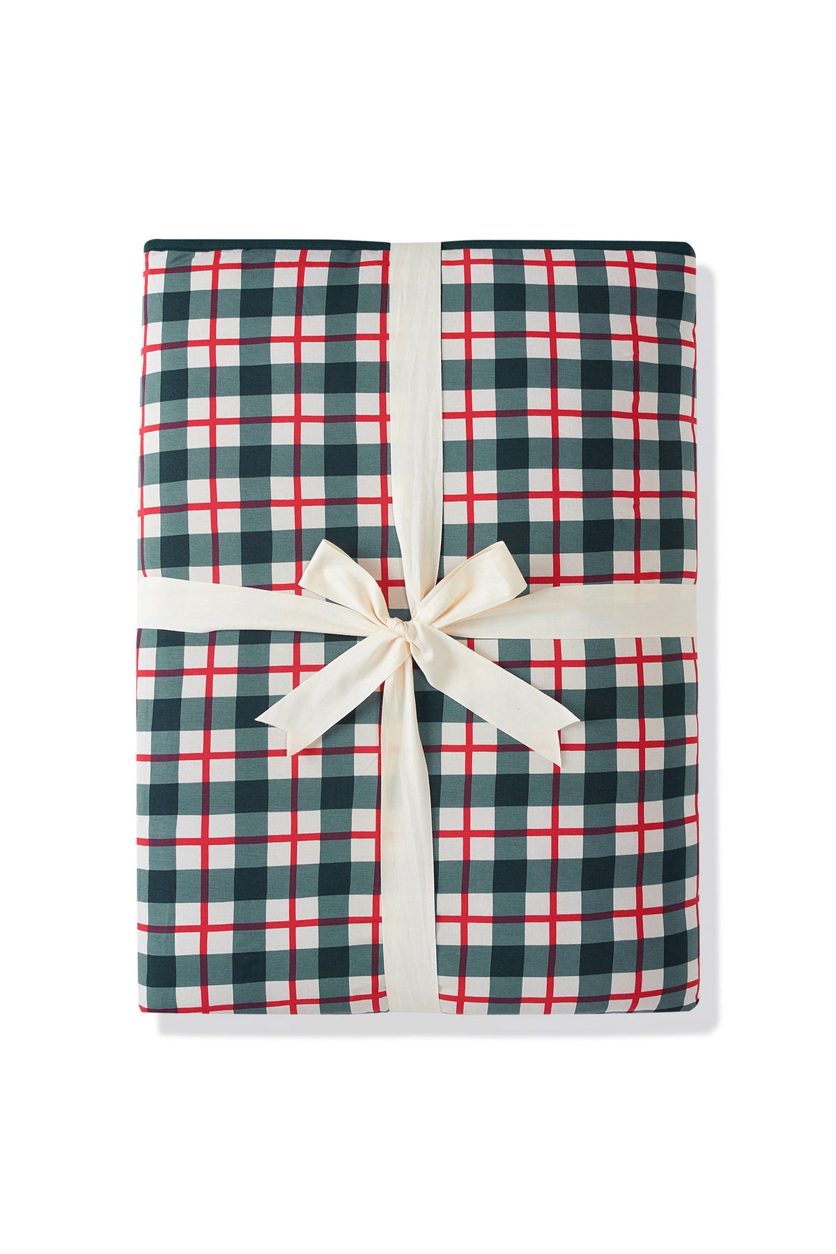A folded gift box or package wrapped in a green, white, and red gingham plaid pattern, tied with a cream-colored satin ribbon and bow, on a white background.