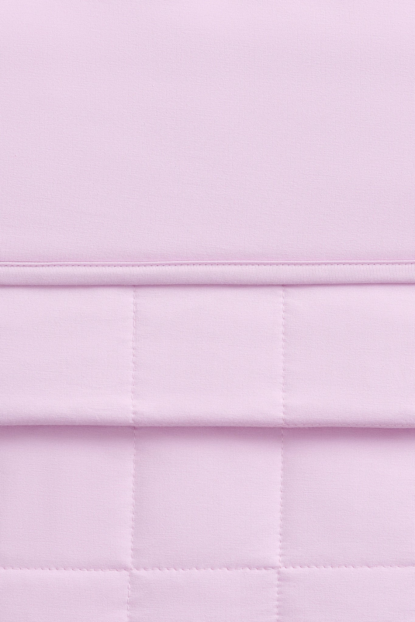 Close-up of a light purple bamboo quilt 